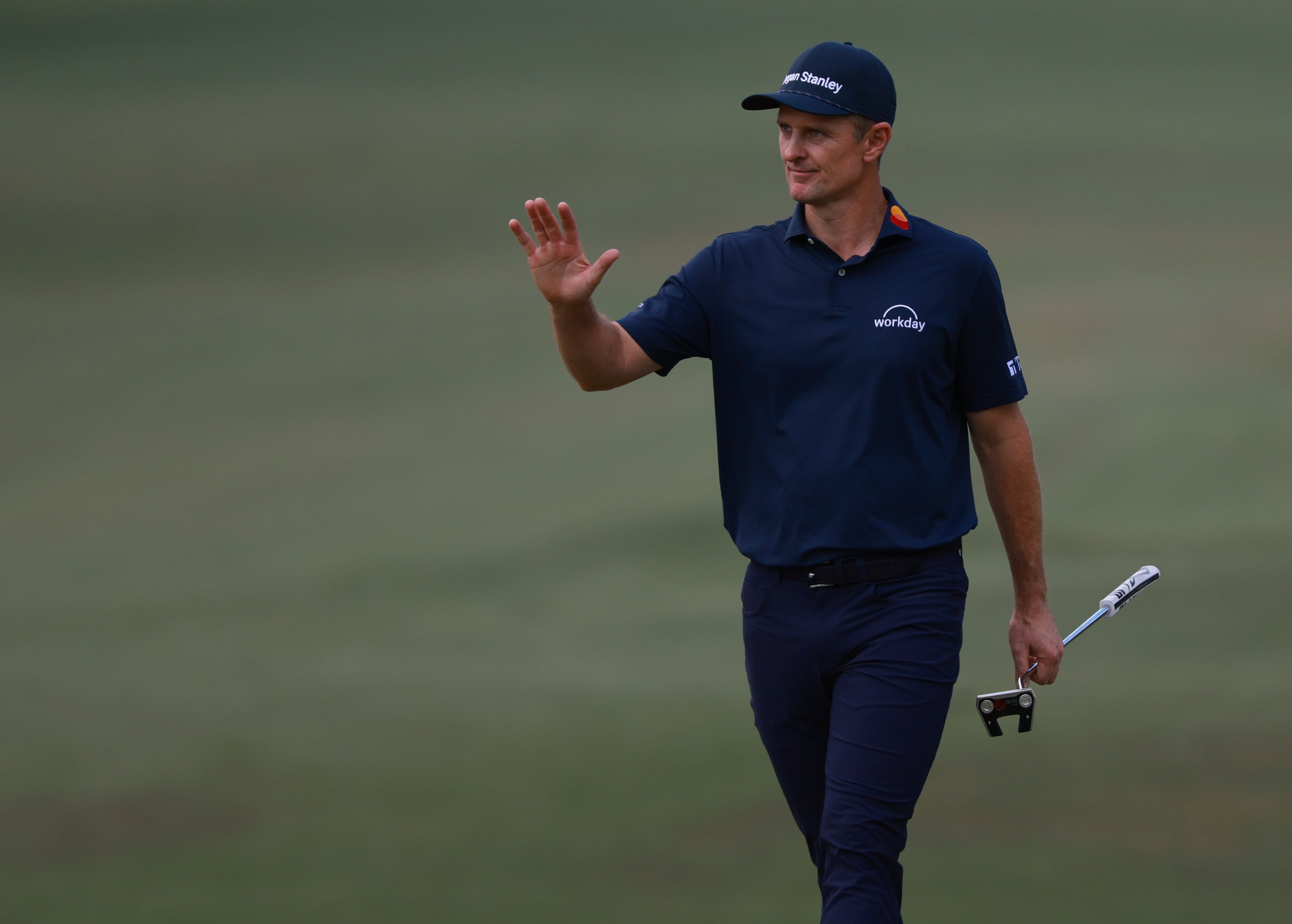Justin Rose acknowldges applause as we hewalks to 10th green during final round of the Masters, at Augusta National Golf Club, Sunday, April 12, 2026, in Augusta, GA (Jason Getz/AJC)