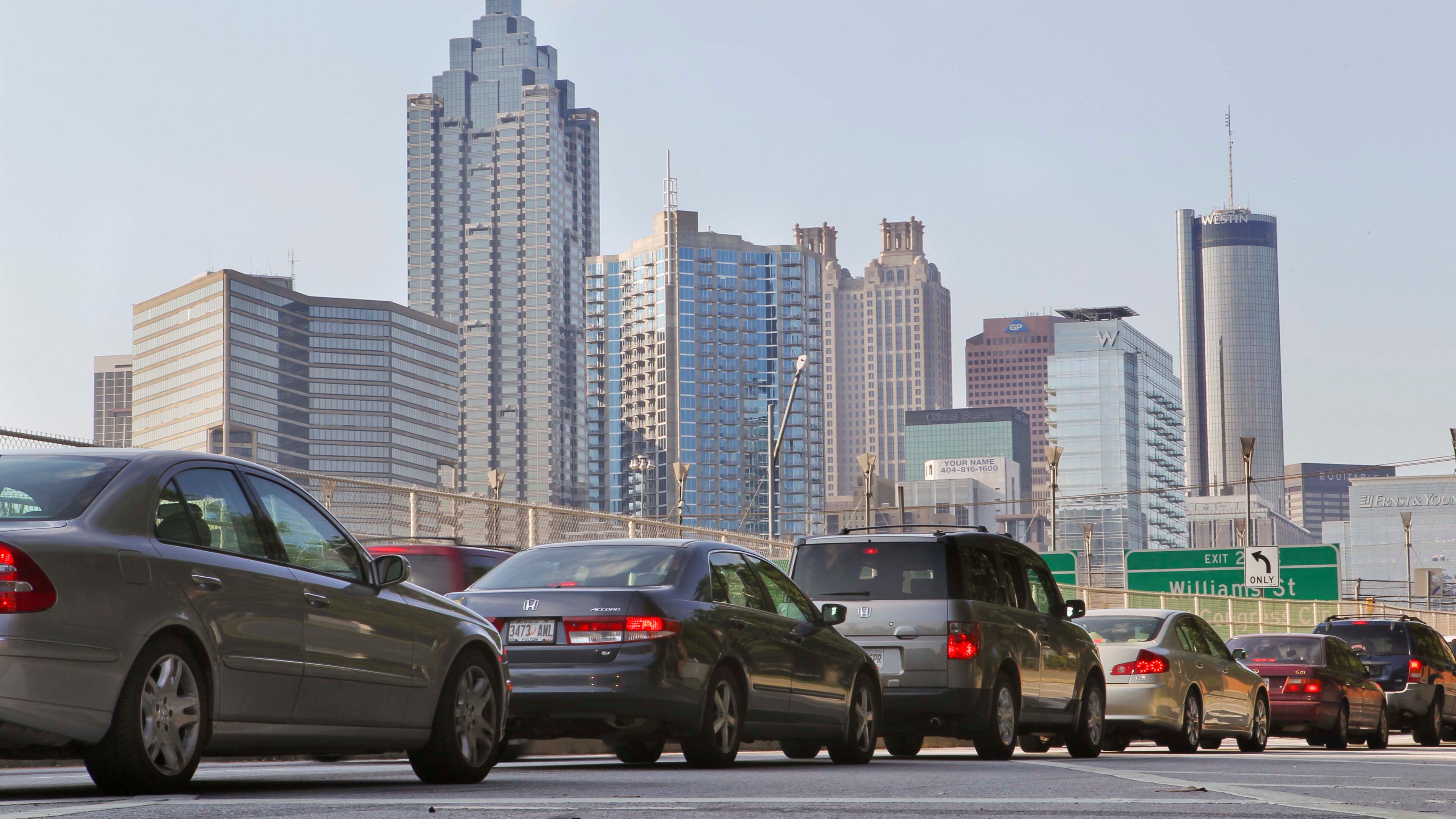 About one of every eight Americans is expected to be on the road this week. Expect delays, but you can also expect gas to be cheaper than it has been for some time.