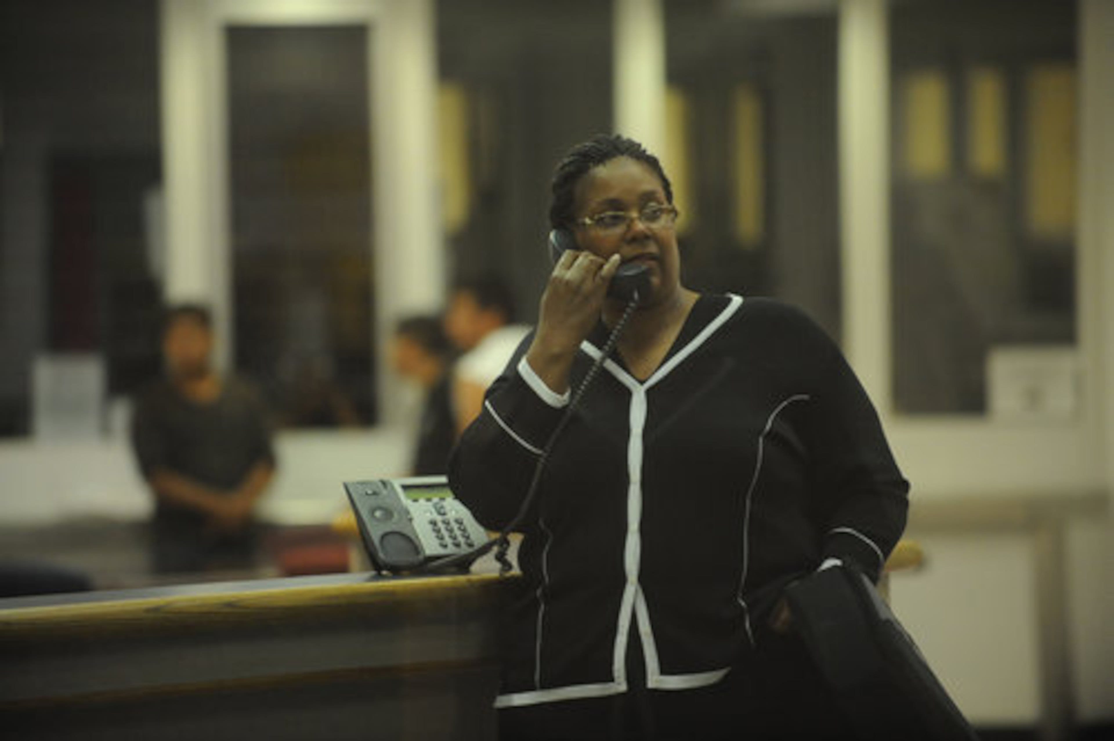 Sheila Michael talks on the phone at the jail. Her daughter, Aimee Michael has been in jail since April 23. On April 12, her BMW struck another car on Camp Creek Parkway, causing a chain reaction crash that killed five, police say.