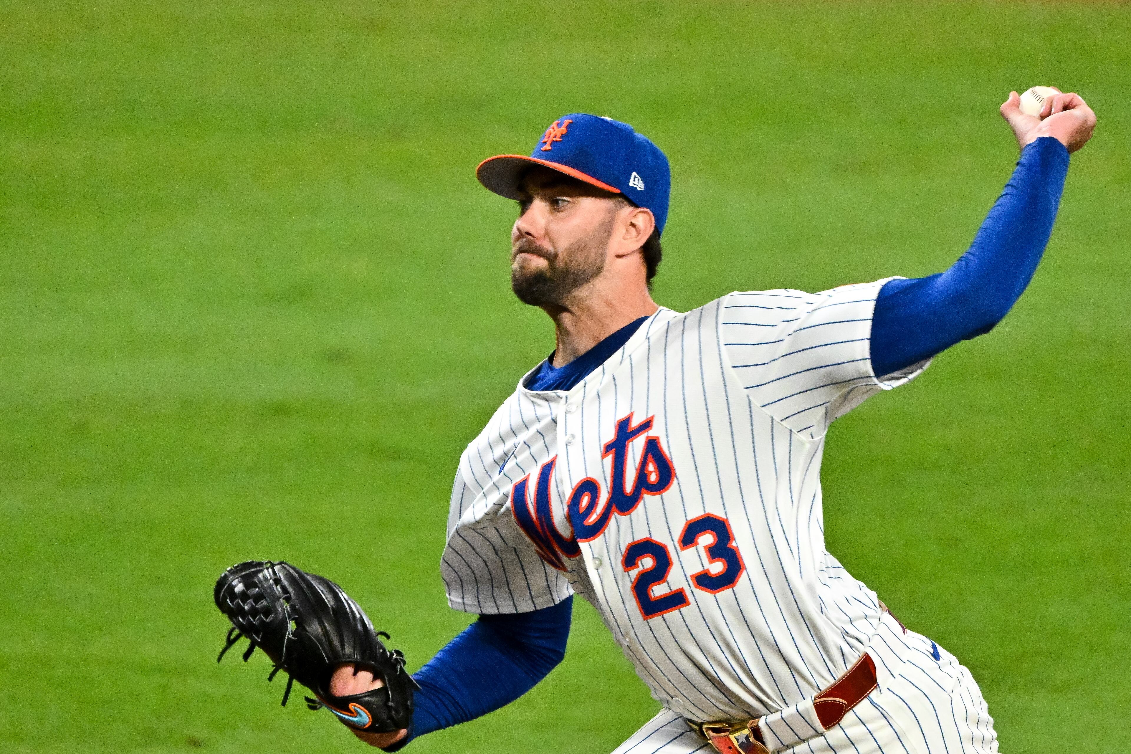 National League pitcher David Peterson of the New York Mets delivers in relief to the American League during the second inning of the MLB All-Star Game at Truist Park in Atlanta on Tuesday, July 15, 2025. (Hyosub Shin/AJC)