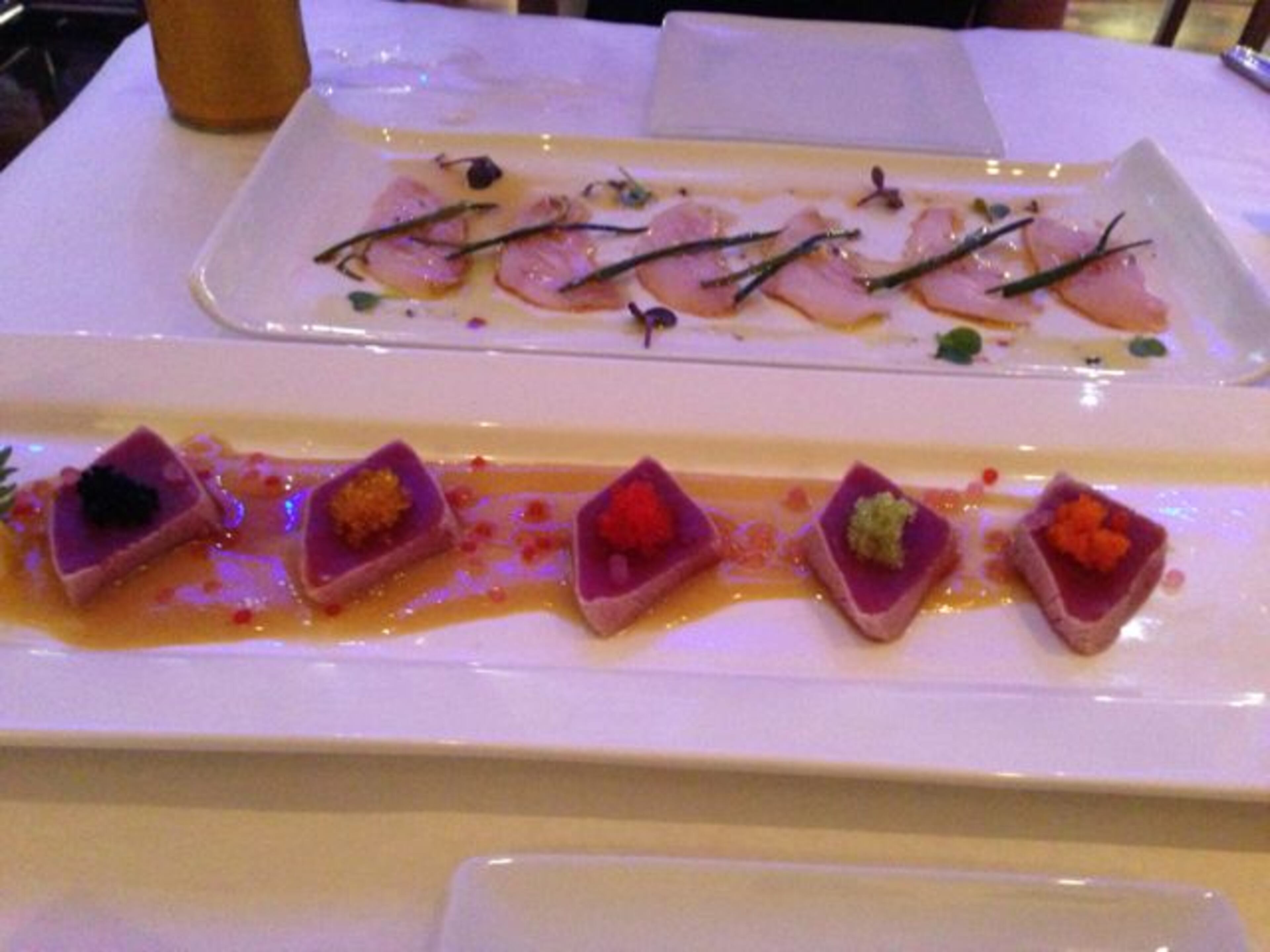 "The sushi bar makes a lot of flashy plated appetizers, including this tuna honey-miso caviar sashimi. I found the pieces pretty thick and cumbersome — too much for a bite. Ditto the (not pictured) pieces of kampachi “new-style sashimi” in yuzu-soy with warmed sesame oil and chives. Warm, chewy raw fish doesn’t appeal too much."