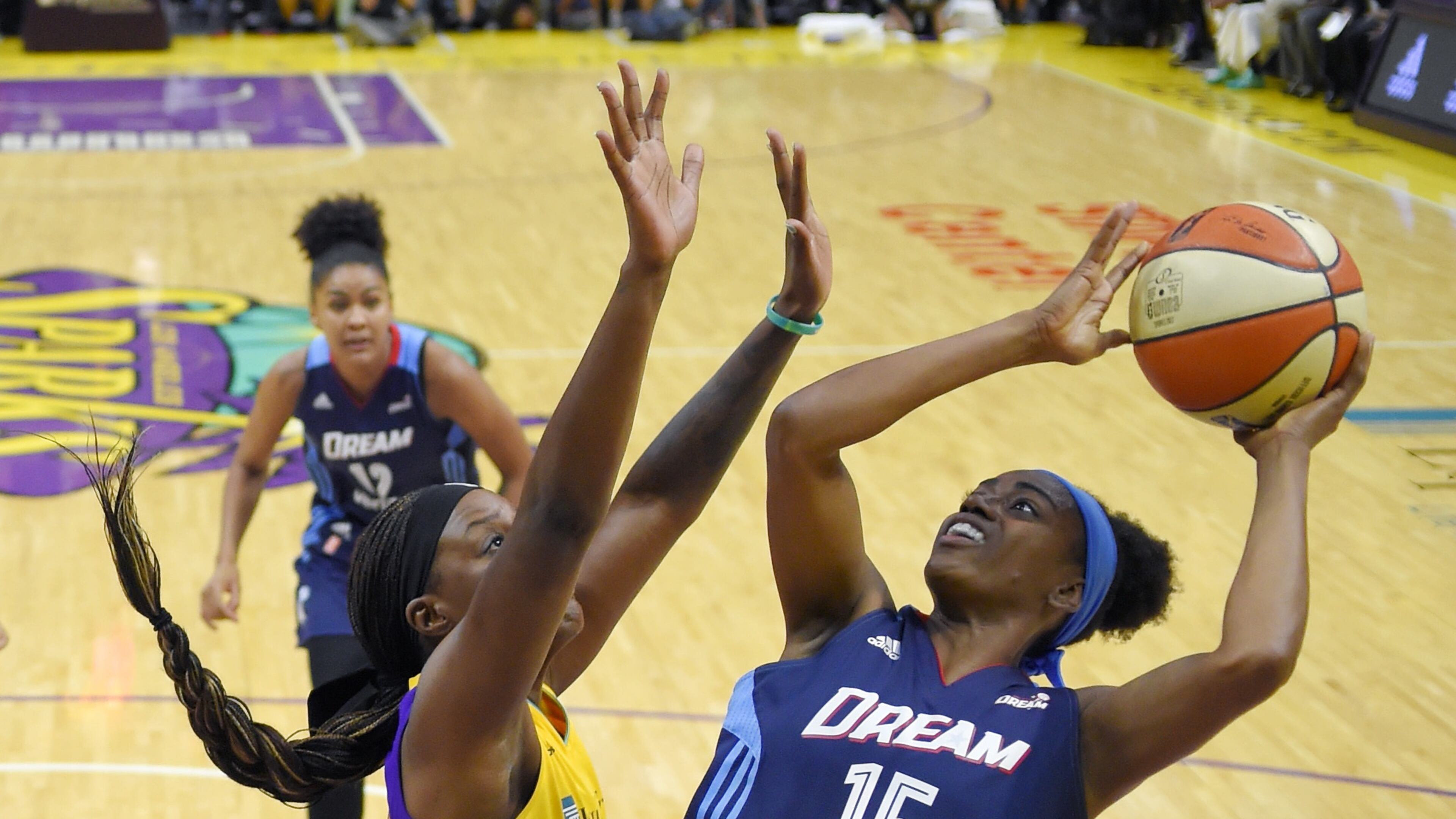 Atlanta Dream guard Tiffany Hayes, right, shoots as Los Angeles Sparks forward Tiffany Jackson-Jones defends during the second half of a WNBA basketball game, Friday, Sept. 1, 2017, in Los Angeles. The Sparks won 81-56. (AP Photo/Mark J. Terrill)