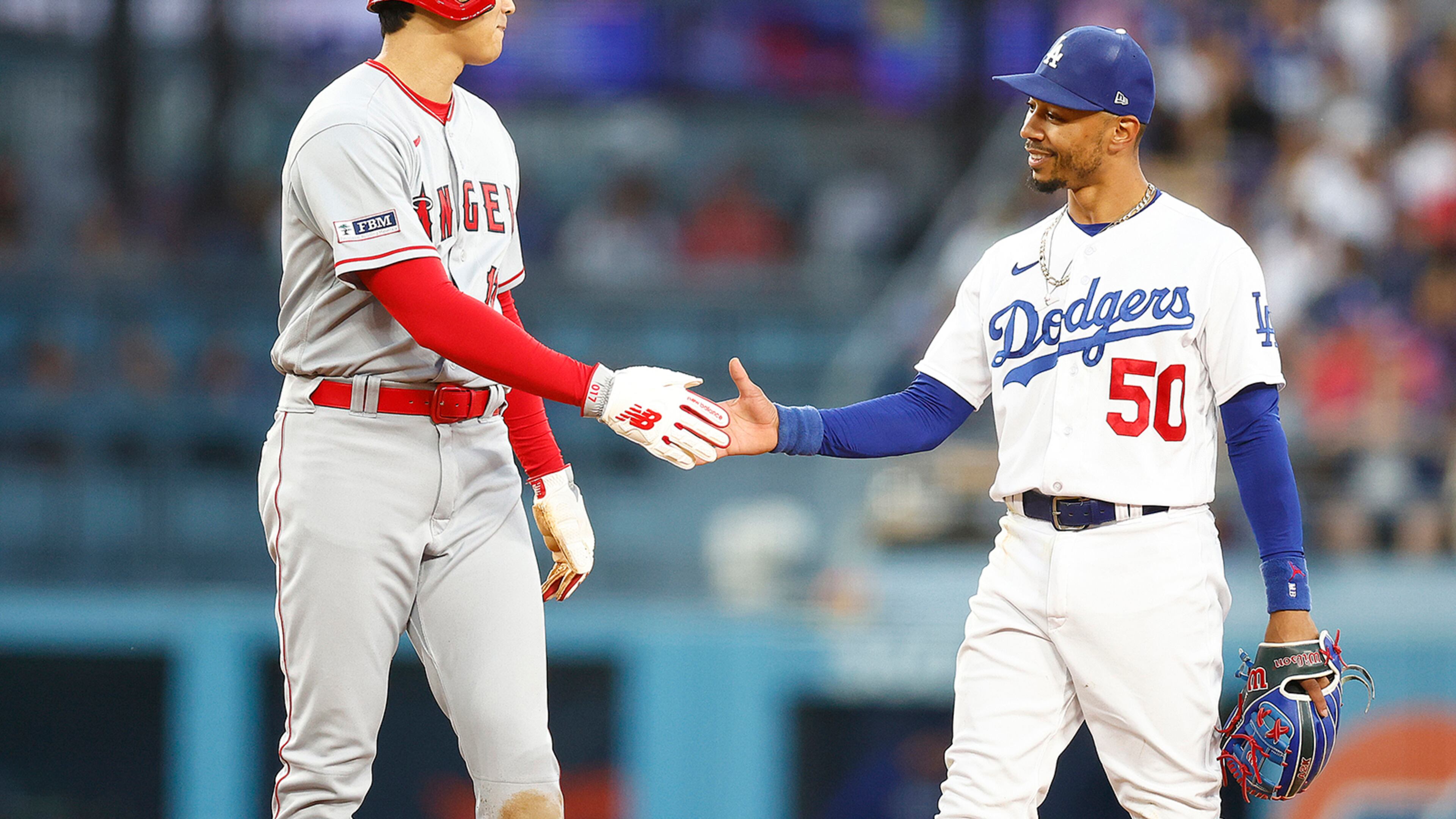 Mookie Betts #50 of the Los Angeles Dodgers and Shohei Ohtani #17 of the Los Angeles Angels in the fourth inning at Dodger Stadium on July 7, 2023, in Los Angeles, California. (Ronald Martinez/Getty Images/TNS)