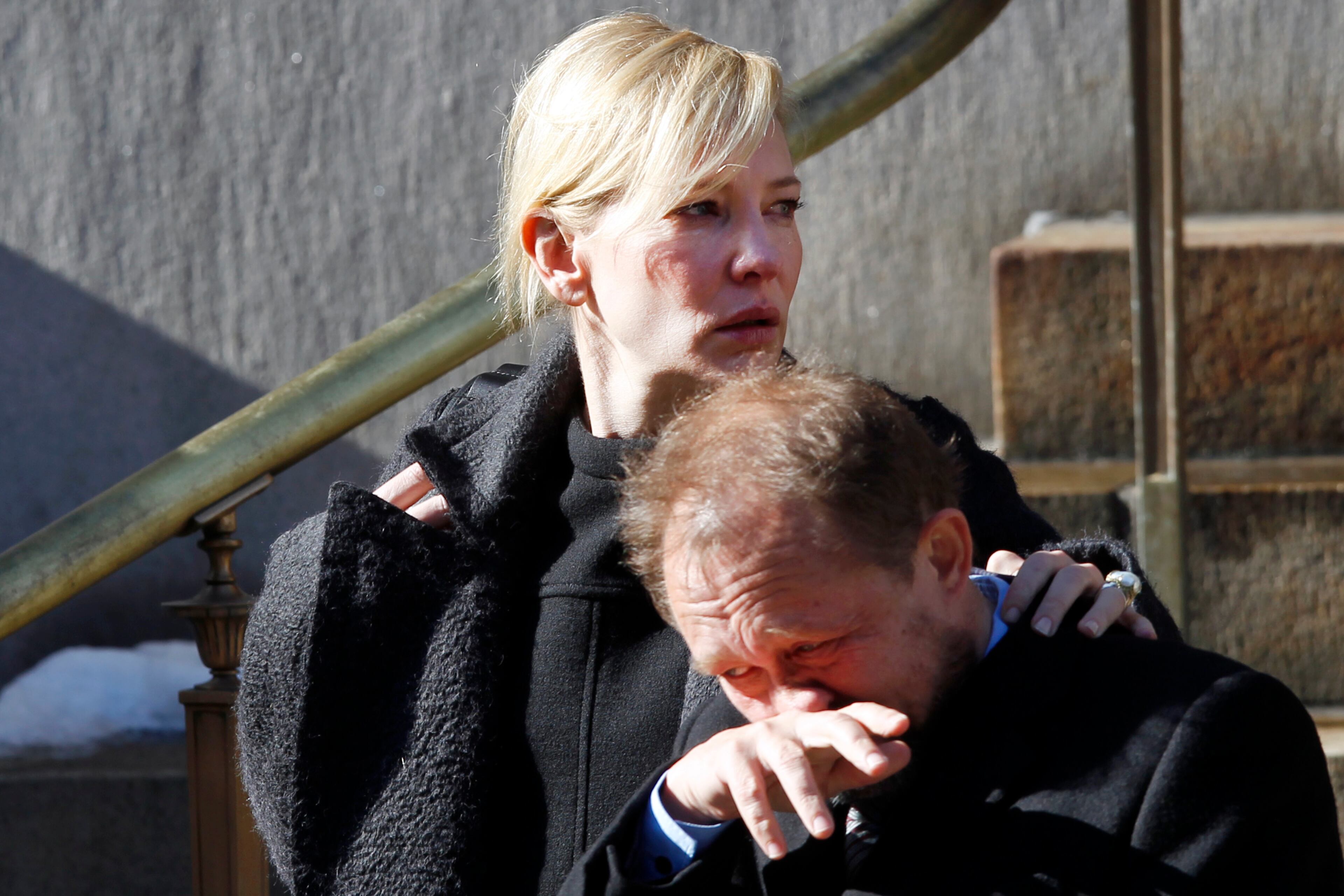Actress Cate Blanchett and her husband Andrew Upton leave the funeral of actor Philip Seymour Hoffman Friday, Feb. 7, 2014, in New York. Hoffman, 46, was found dead Sunday of an apparent heroin overdose. (AP Photo/Jason DeCrow)
