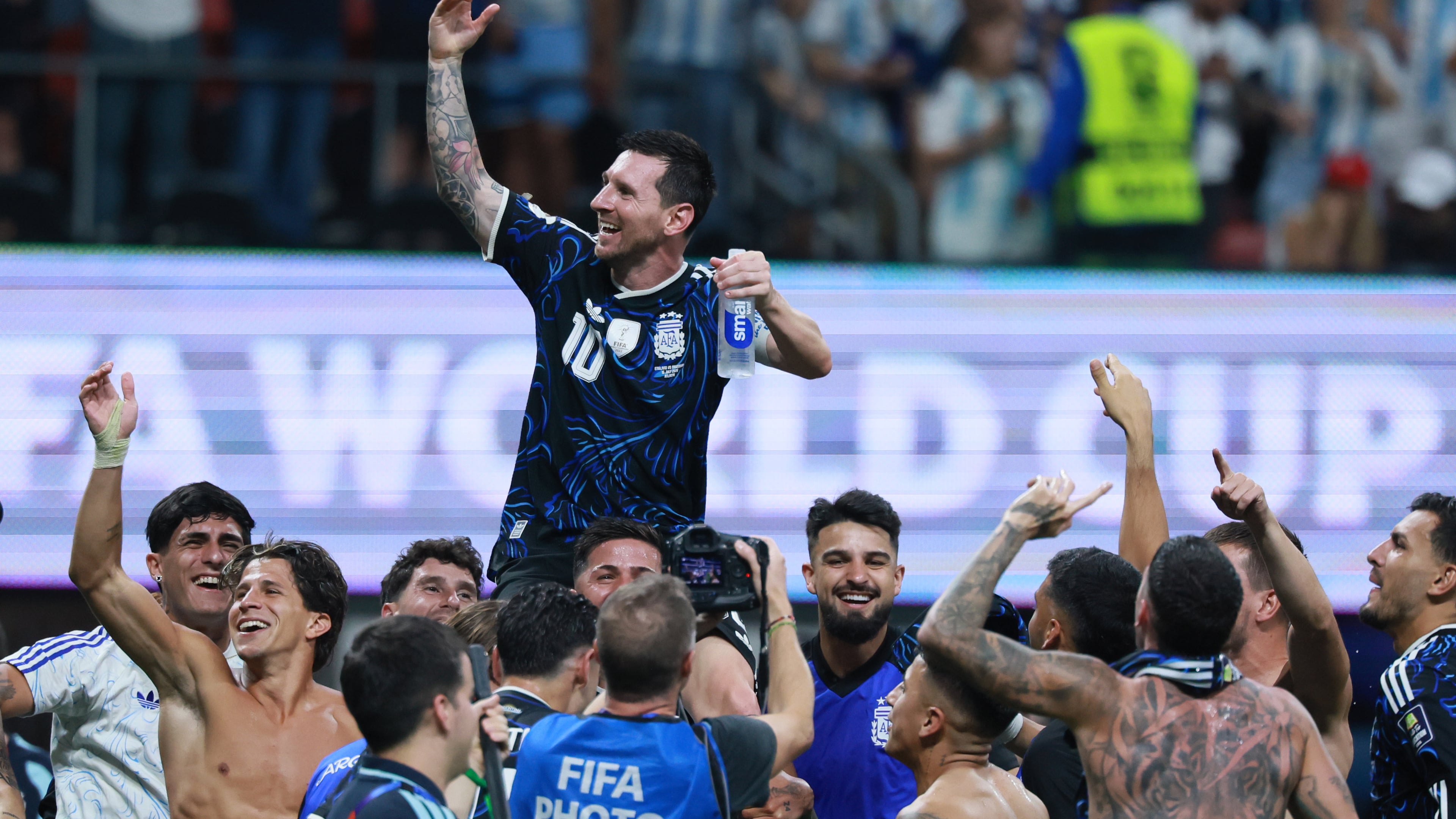 Argentina's Lionel Messi is lifted on the shoulders of teammates following victory against England in the FIFA World Cup Semifinal match at Atlanta Stadium (Mercedes-Benz Stadium) on Wednesday, July 15, 2026. (Jason Getz/AJC)