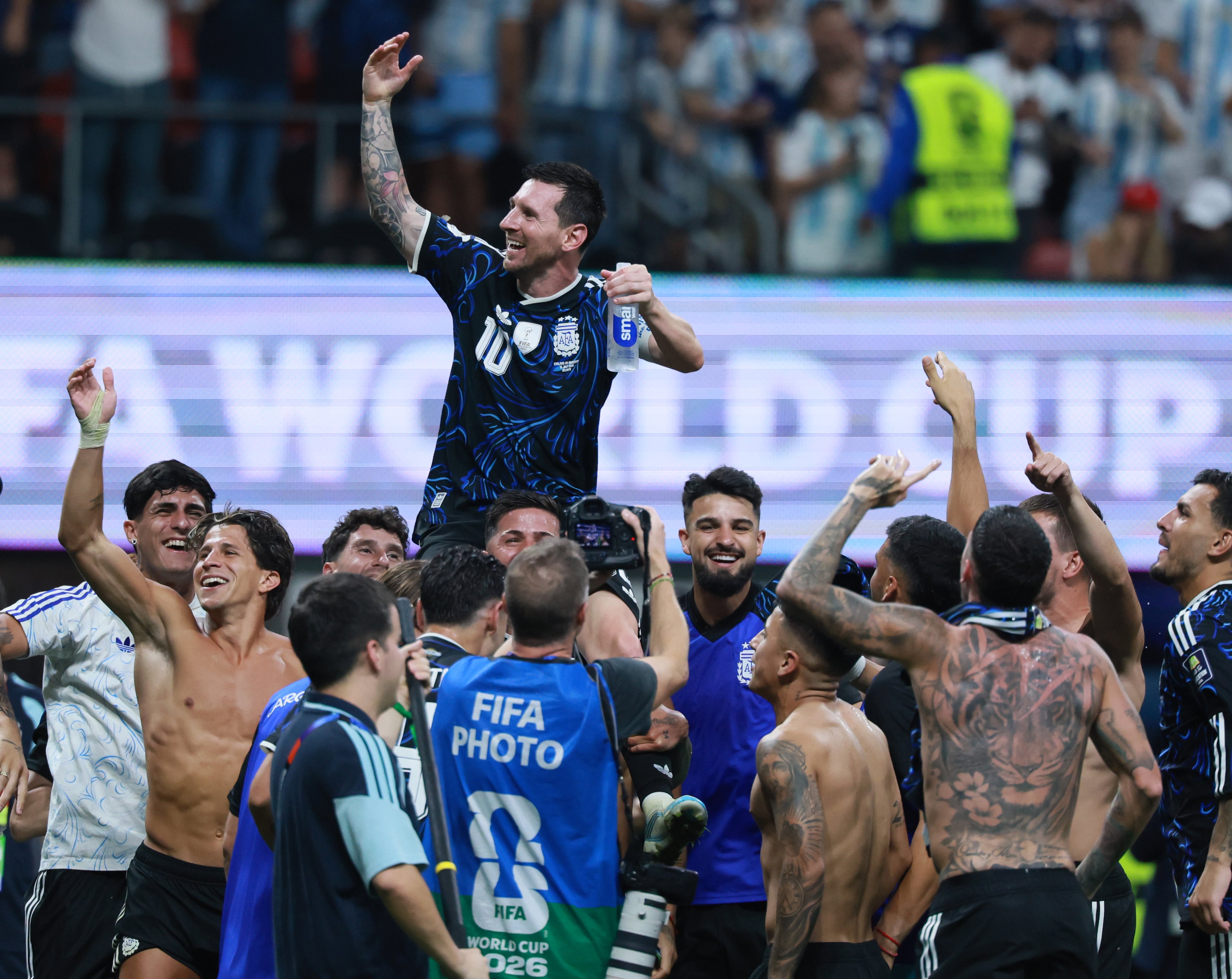 Argentina's Lionel Messi is lifted on the shoulders of teammates following victory vs. England FIFA World Cup Semifinal match at Atlanta Stadium (Mercedes-Benz Stadium) on Wednesday, July 15, 2026. (Jason Getz/AJC)
