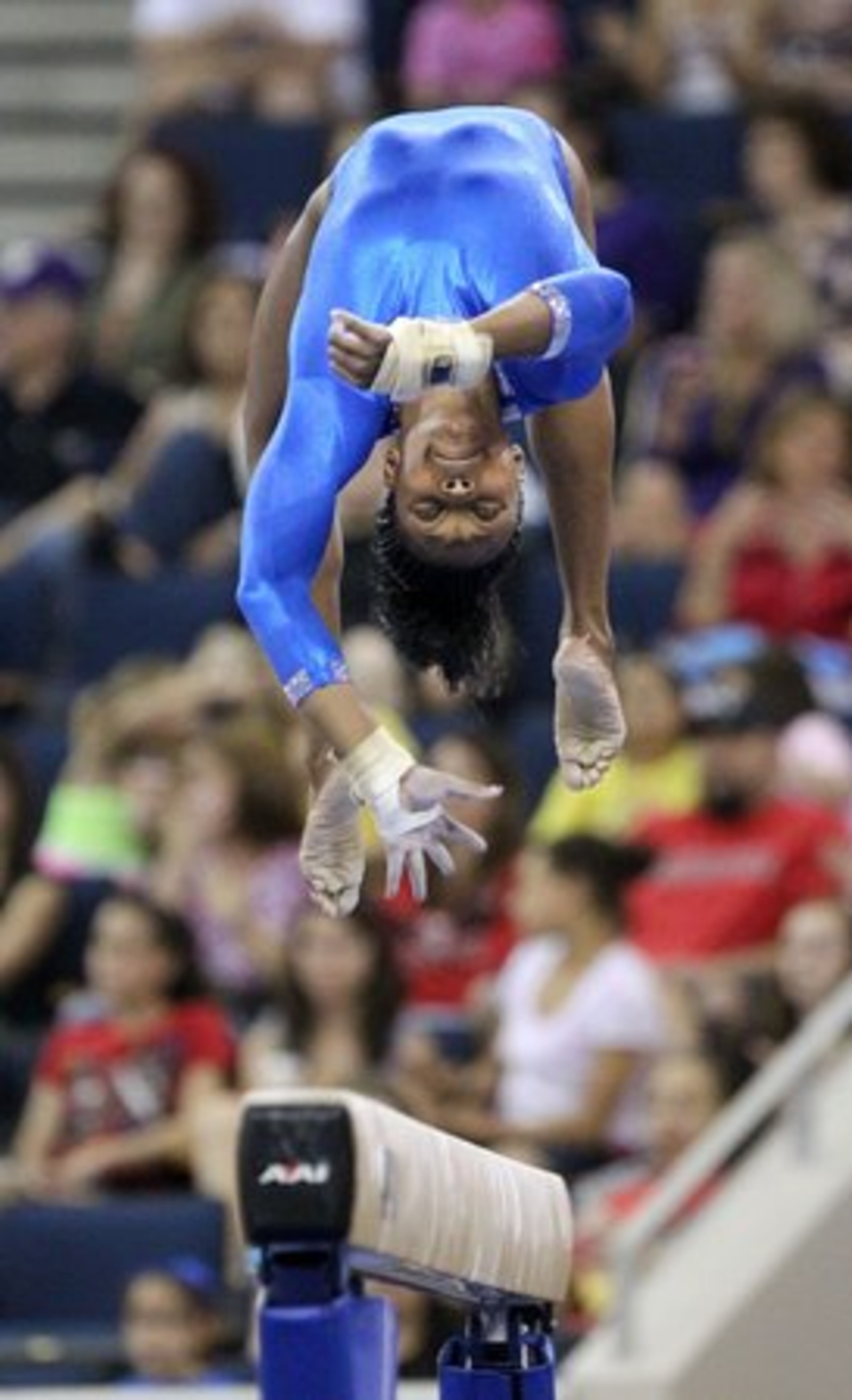 Florida gymnast Ashanee Dickerson competes on the beam. She scored a 9.850 on the beam exercise.