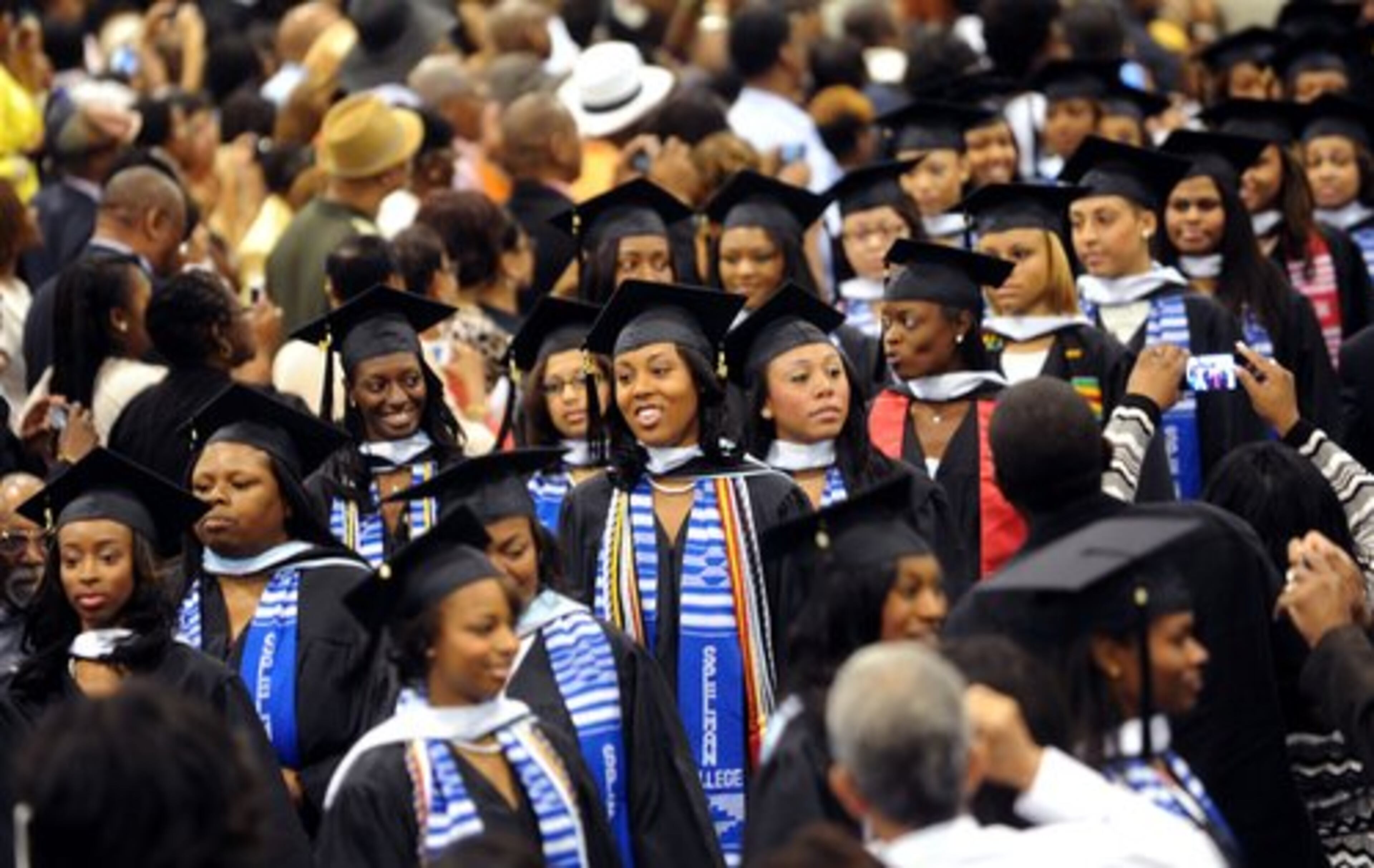 The Spelman College Class of 2012 makes its way past family and friends during the processional at the beginning of commencement.