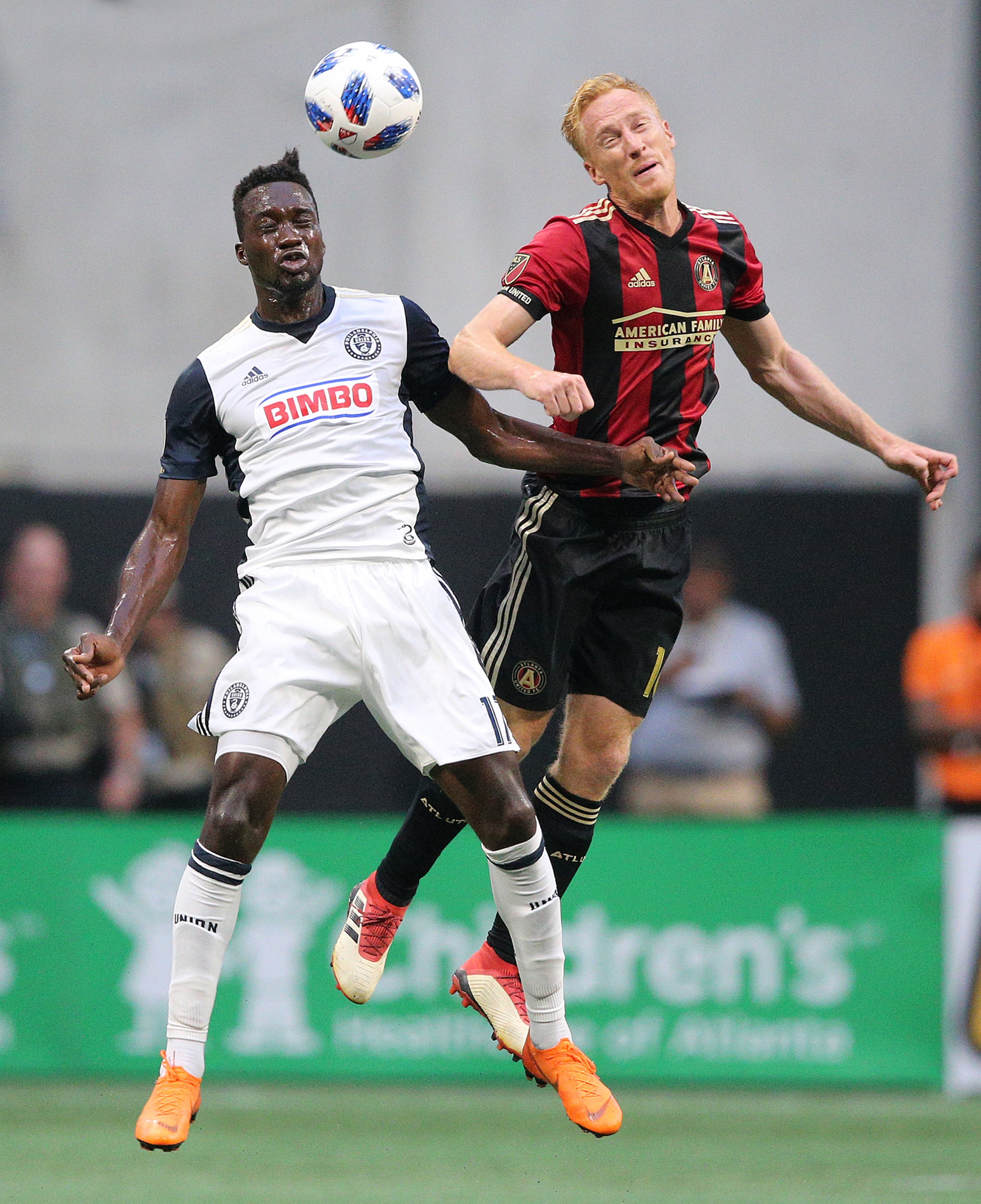 June 2, 2018 Atlanta: Atlanta United midfielder Jeff Larentowicz battles for a header with Philadelphia Union forward CJ Sapong during the first half in a MLS soccer match on Saturday, June 2, 2018, in Atlanta. Curtis Compton/ccompton@ajc.com
