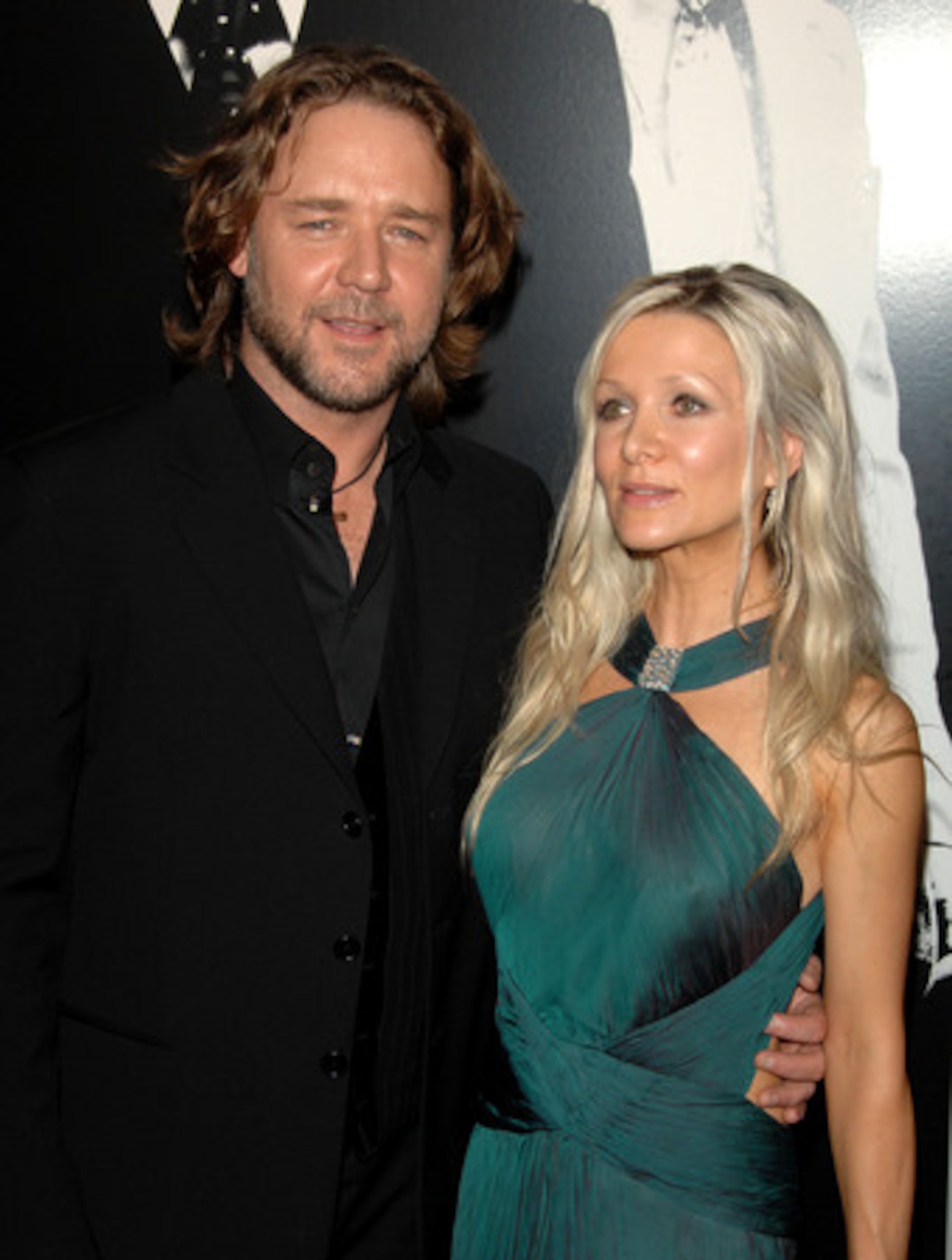 Russell Crowe and his wife, Danielle Spencer, arrive for the movie premiere. Crowe plays an outcast cop who tangles with Denzel Washington's crime boss.