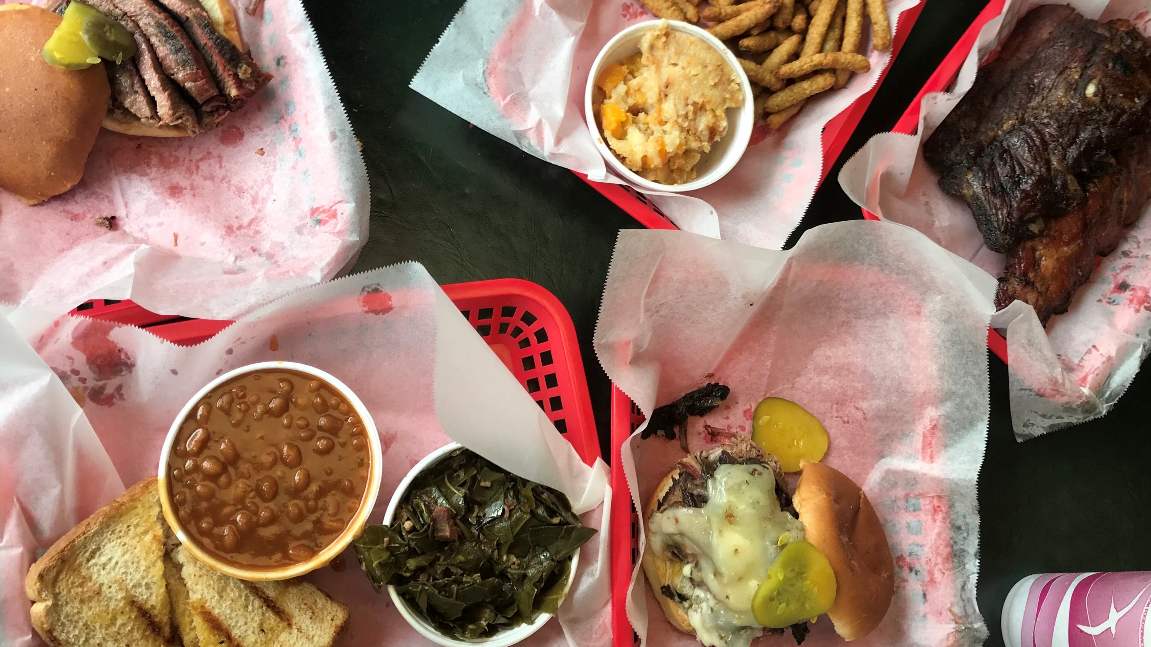 The brisket sandwich and other dishes at Pit Boss BBQ.