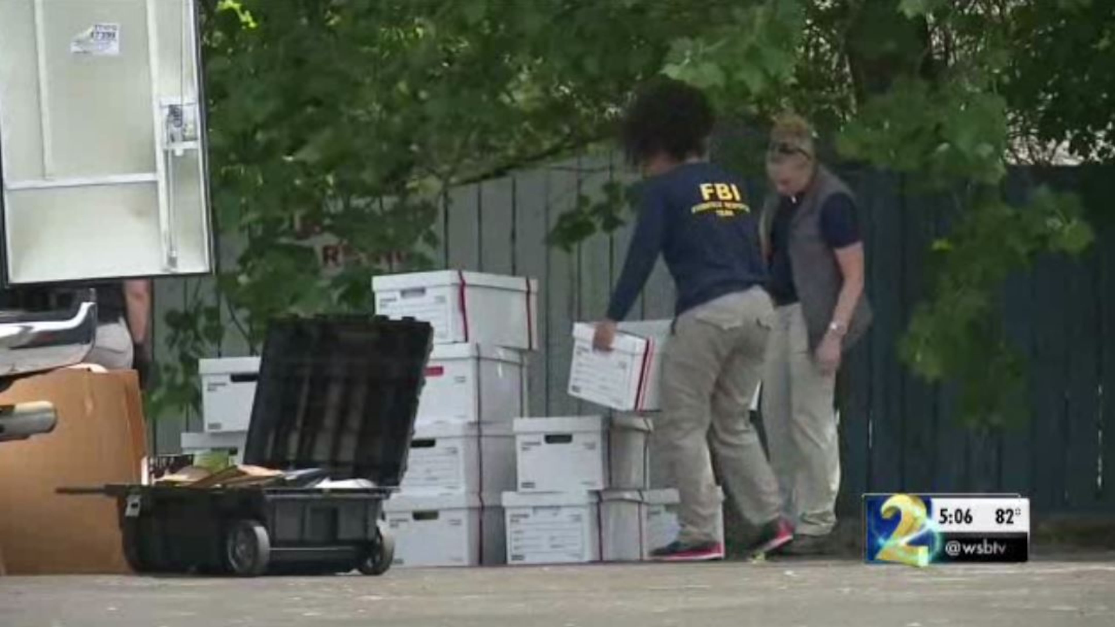 Federal agents seize documents from homes and business belonging to a Bartow County man arrested Tuesday for his alleged role in a tax-dodging scheme.