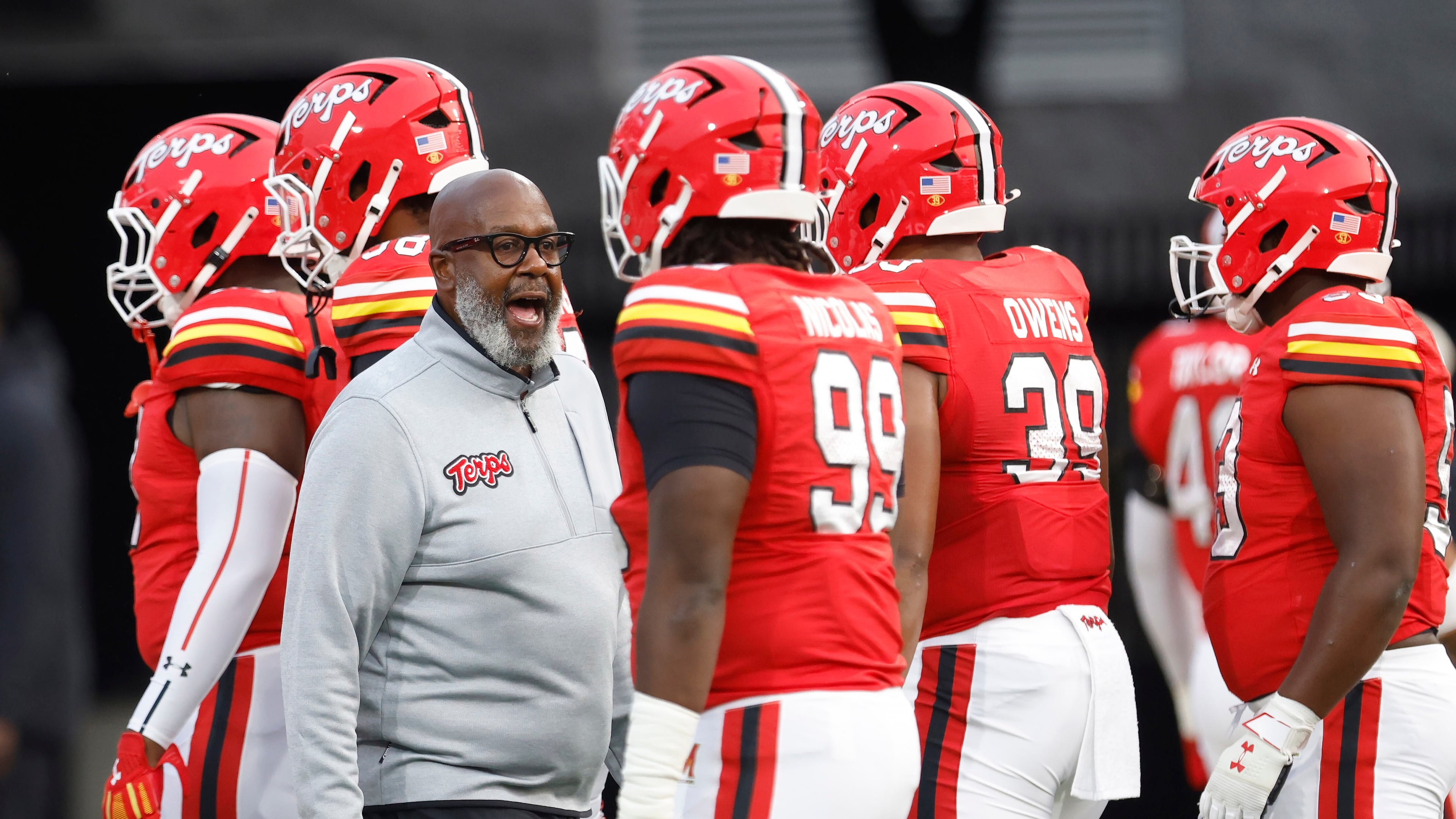 FILE - Maryland head coach Mike Locksley encourages his players before an NCAA football game against Northern Illinois, Sept. 5, 2025, in College Park, Md. (AP Photo/Mike Buscher, File)