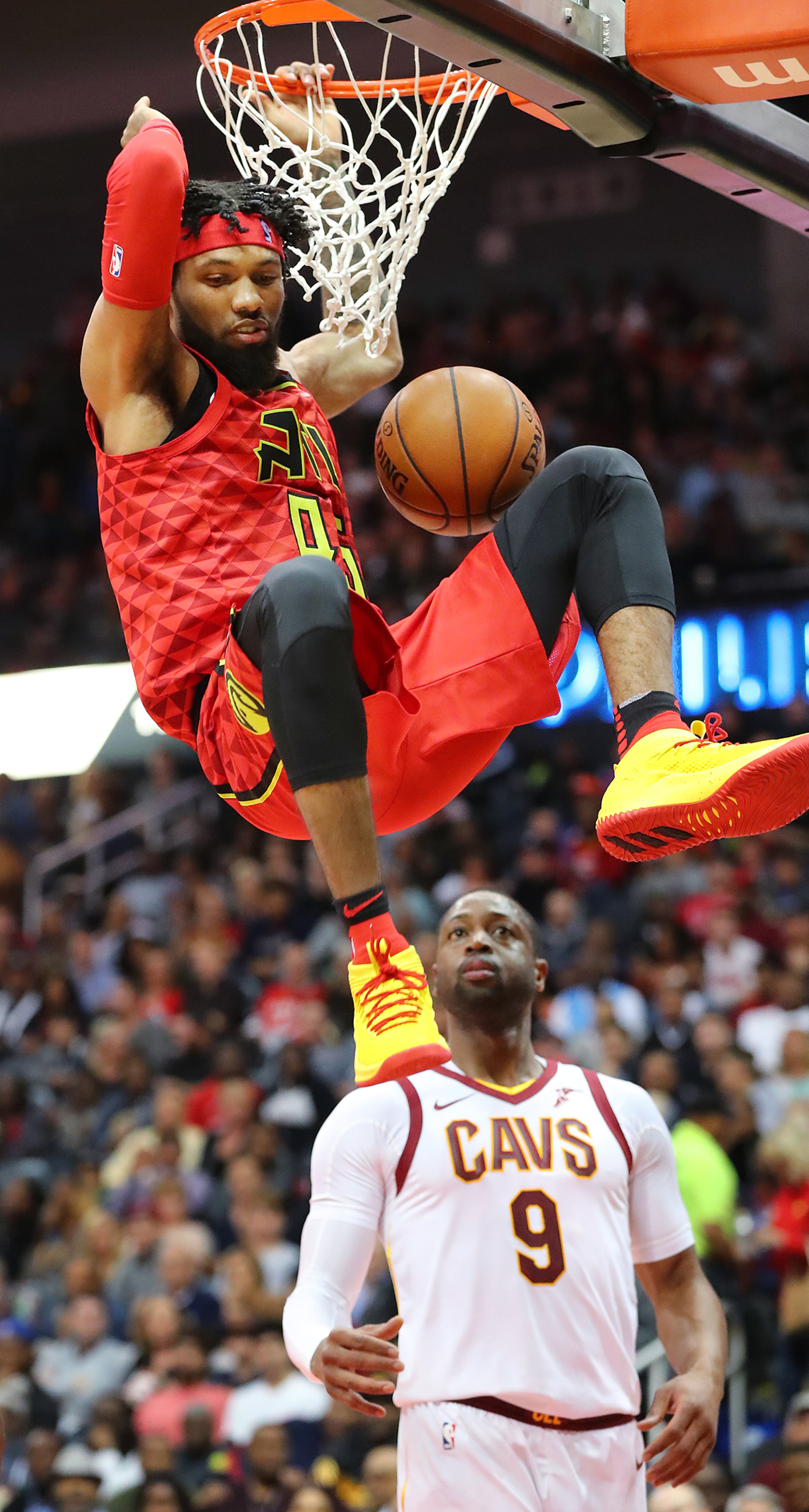 November 30, 2017 Atlanta: Hawks forward DeAndreâ Bembry slams past Cavaliers guard Dwyane Wade in a NBA basketball game on Thursday, November 30, 2017, in Atlanta. Curtis Compton/ccompton@ajc.com