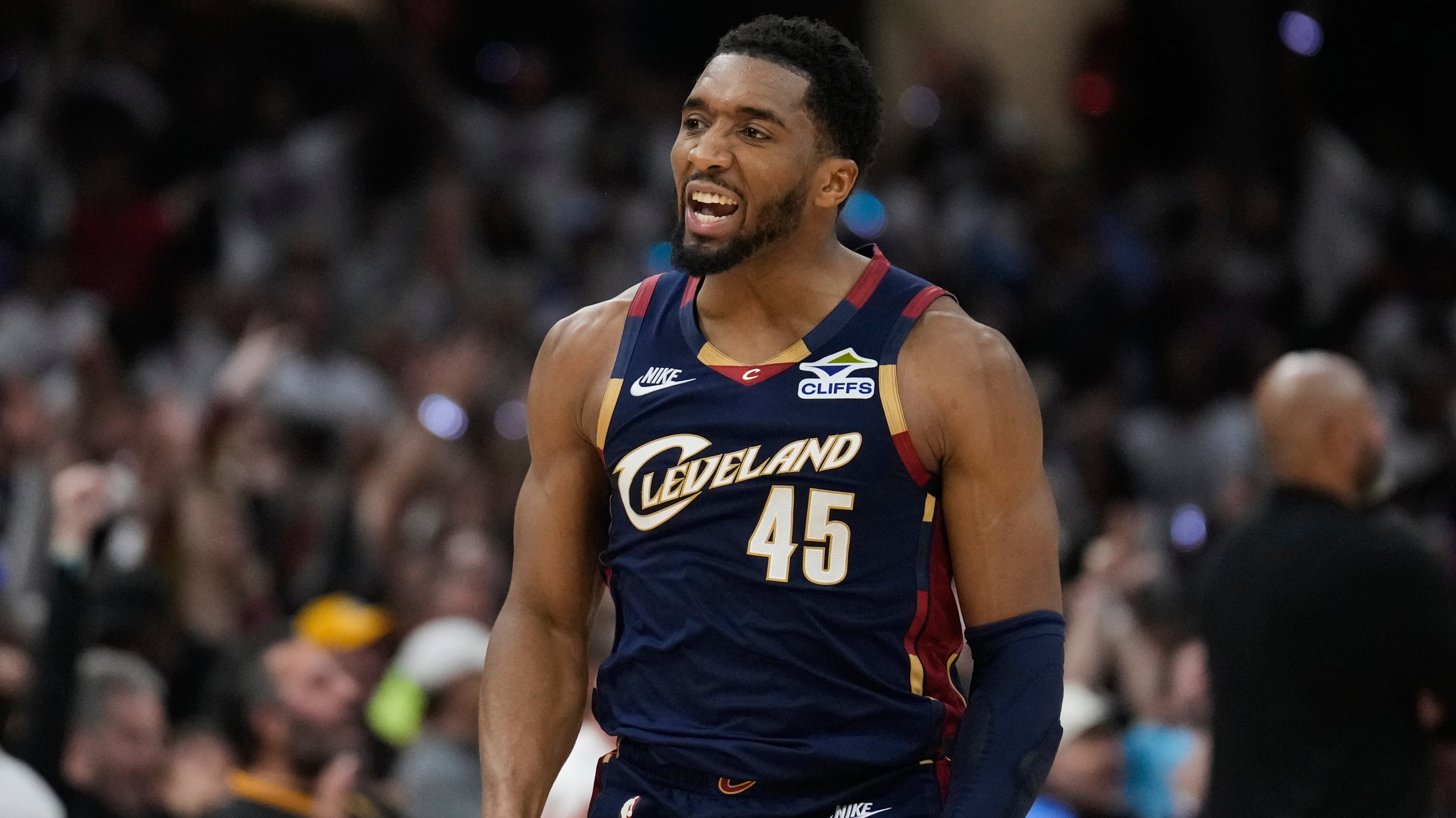 FILE - Cleveland Cavaliers' Donovan Mitchell (45) gestures after hitting a three-point basket inthe second half of Game 4 of a second-round NBA basketball playoff series against the Detroit Pistons, May 11, 2026, in Cleveland. (AP Photo/Sue Ogrocki, File)