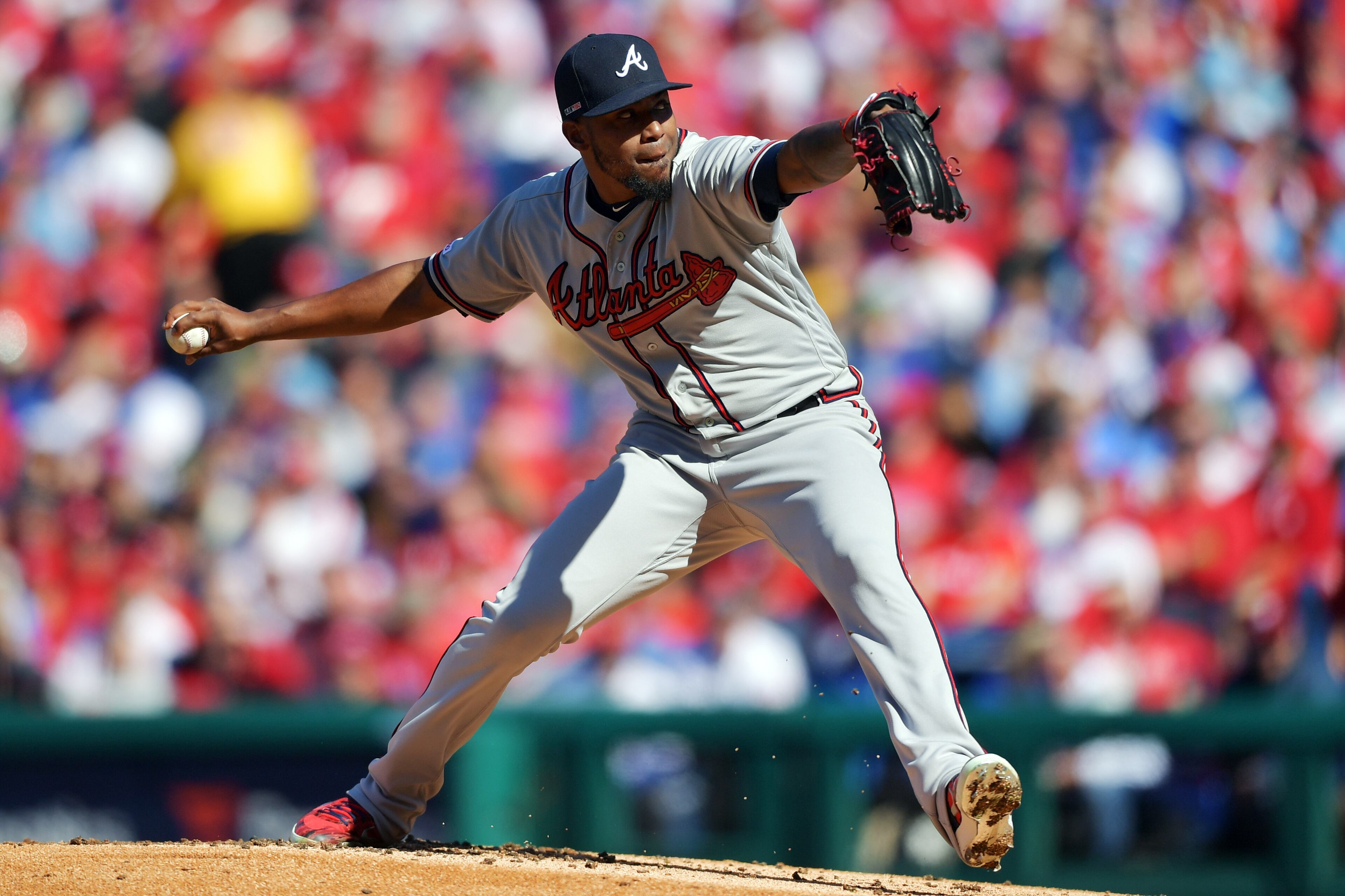 PHILADELPHIA, PA - MARCH 28: Starting pitcher Julio Teheran #49 of the Atlanta Braves delivers a pitch in the first inning against the Philadelphia Phillies on Opening Day at Citizens Bank Park on March 28, 2019 in Philadelphia, Pennsylvania. (Photo by Drew Hallowell/Getty Images)