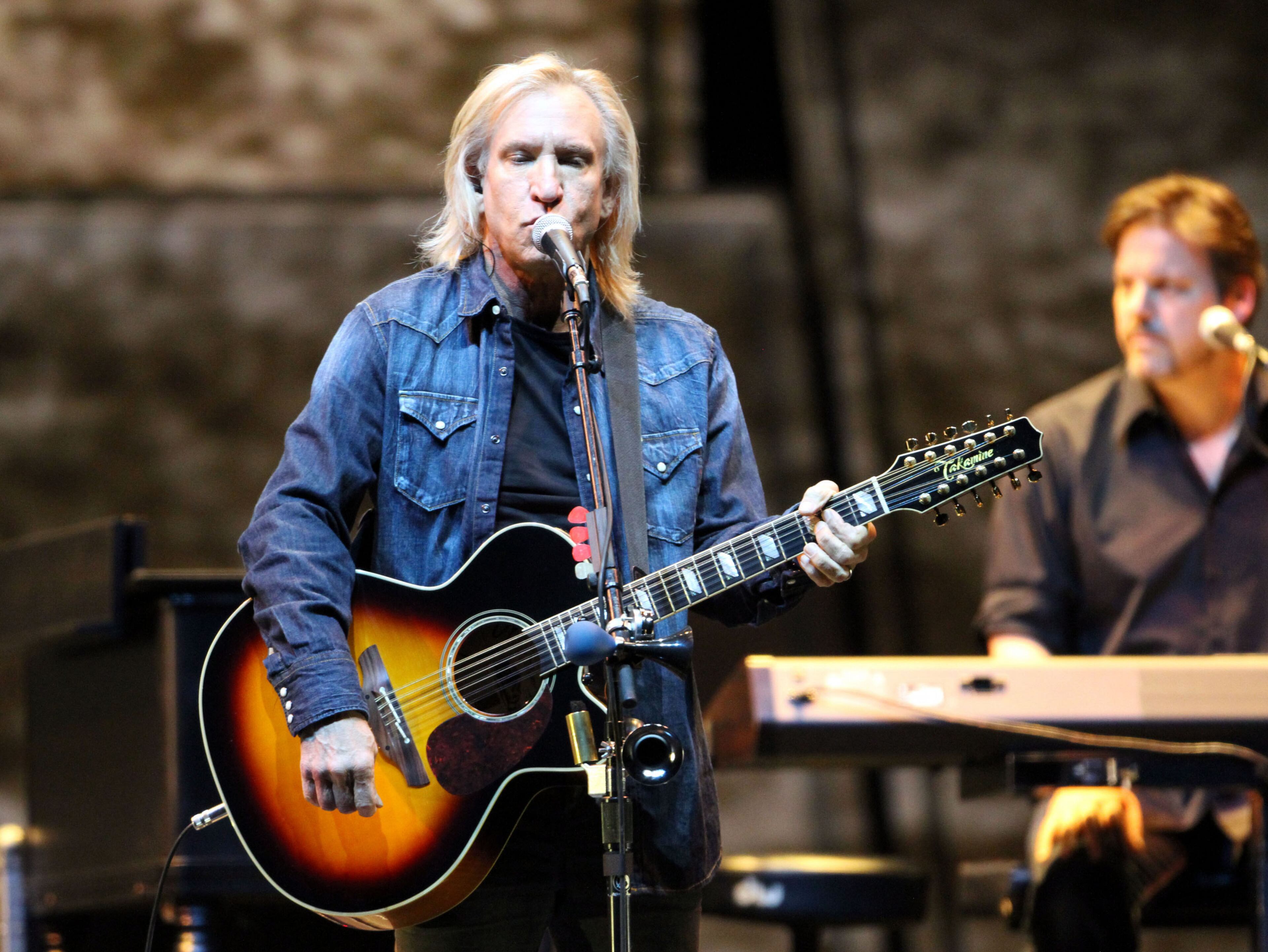 Joe Walsh of The Eagles performs to a sold-out crowd Feb. 24, 2014 at Philips Arena in Atlanta.