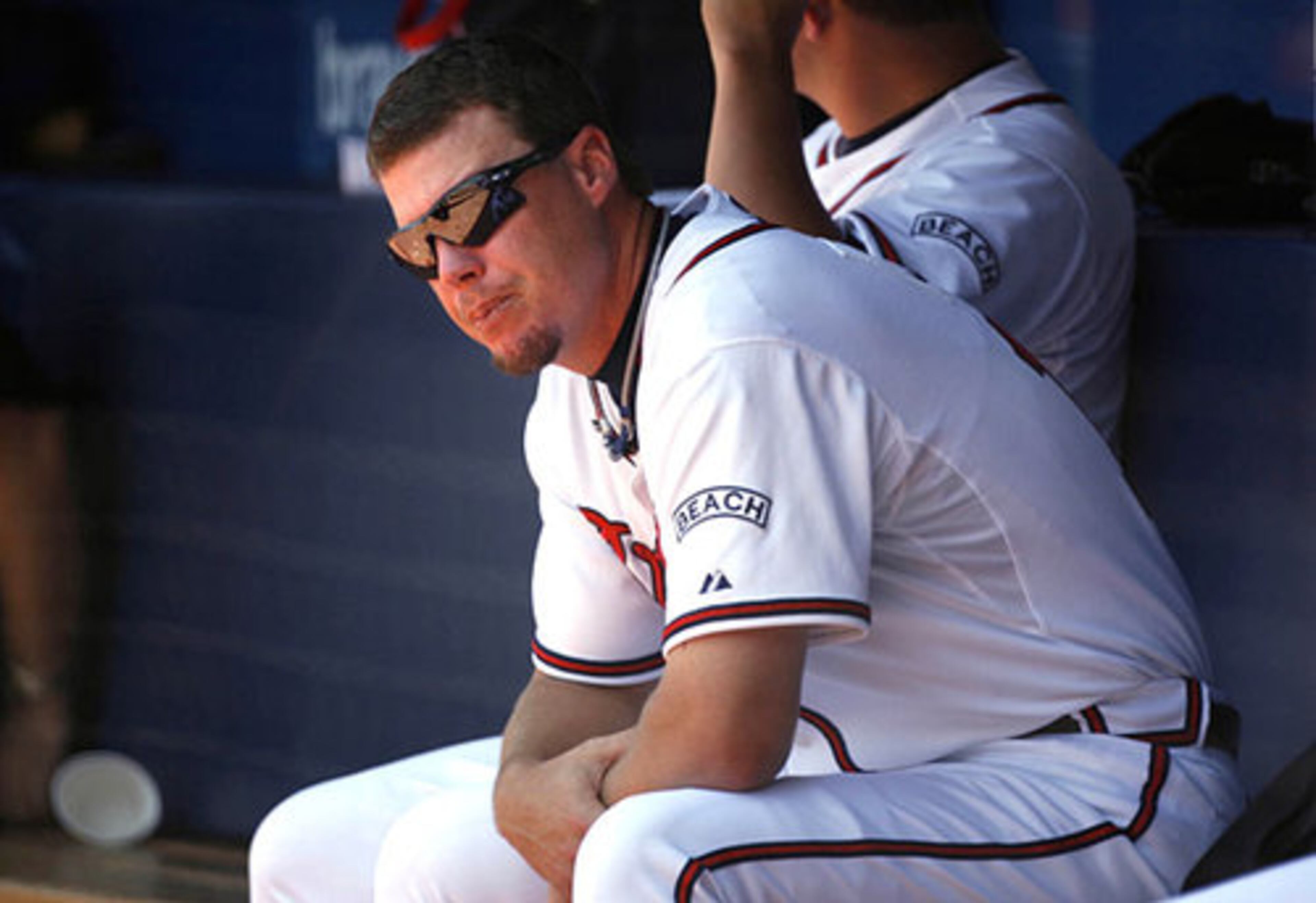 Chipper Jones, who took Wednesday's game off, called losing Smoltz for the season "devastating."
