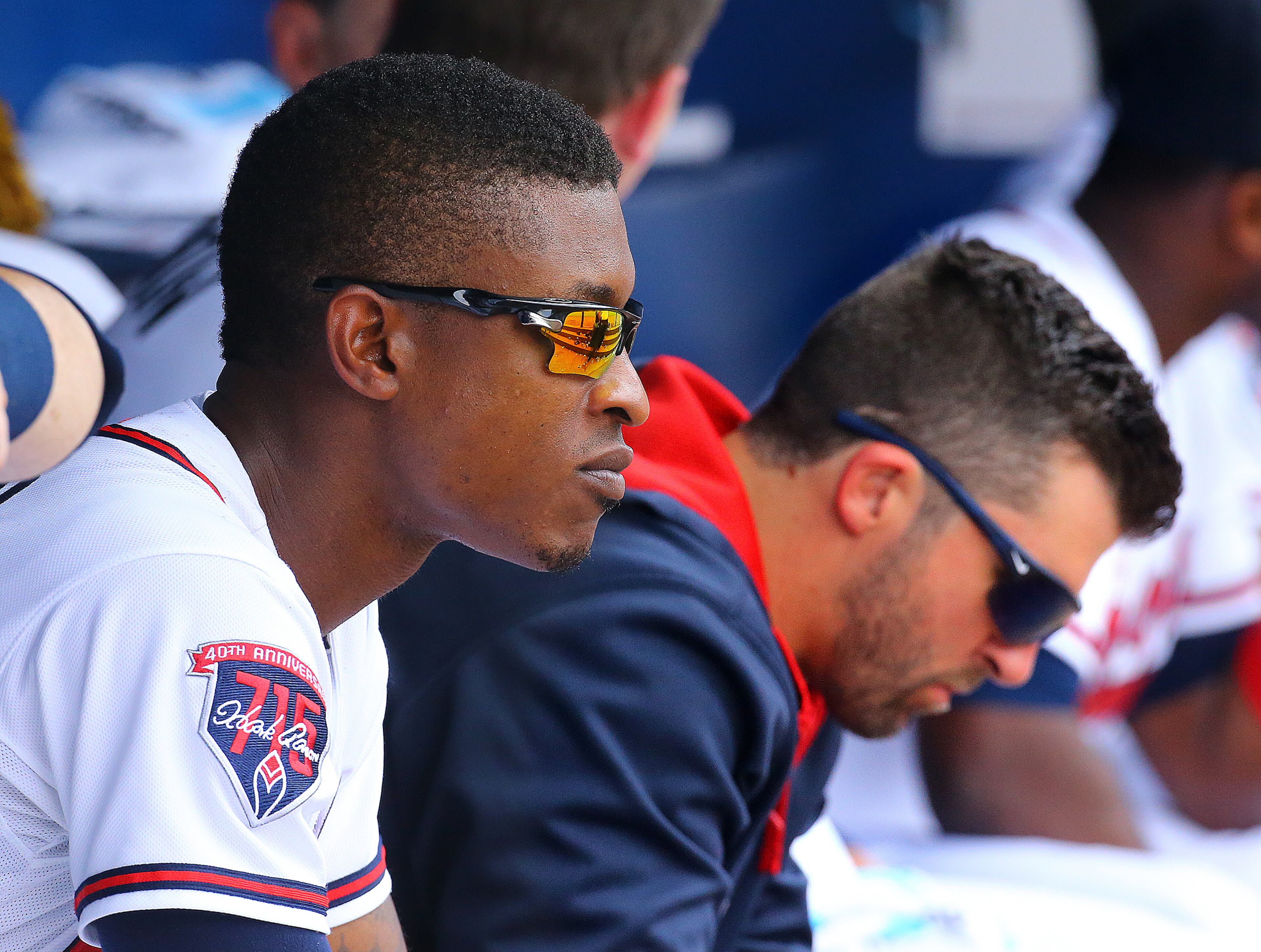 Braves B.J. Upton (left) and Dan Uggla sit on the bench during the ninth inning of a 10-5 loss to the Phillies in their MLB game on Wednesday, June 18, 2014, in Atlanta. Uggla has been relagated to pinch hitting and B.J. Upton, whose batting average is falling, was not in the lineup but made an appearance as a pinch hitter. CURTIS COMPTON / CCOMPTON@AJC.COM