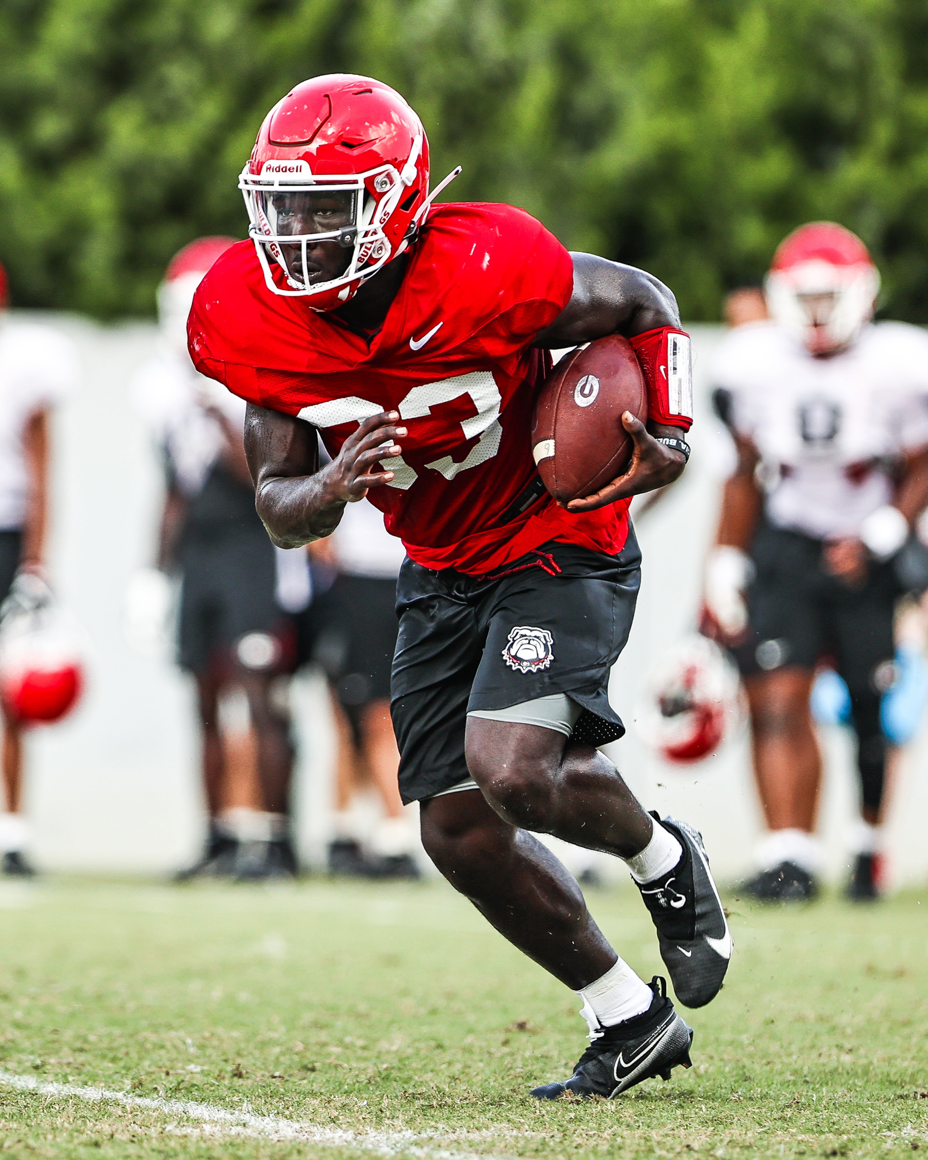 Georgia running back Daijun Edwards (33) looks for running room during the Bulldogs’ practice Tuesday, Aug. 24, 2021, in Athens. (Tony Walsh/UGA)