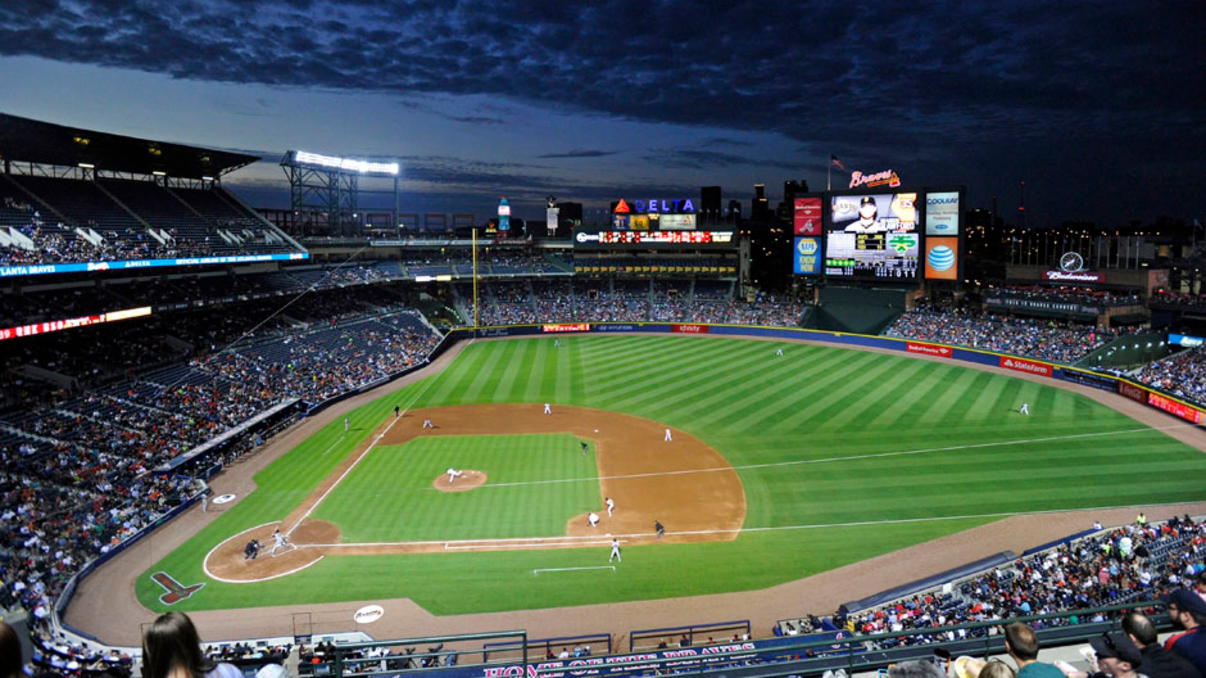Clouds drift past during the third inning of a game between the Atlanta Braves and San Francisco Giants, Friday, May 2, 2014, in Atlanta. (AP Photo/David Tulis)