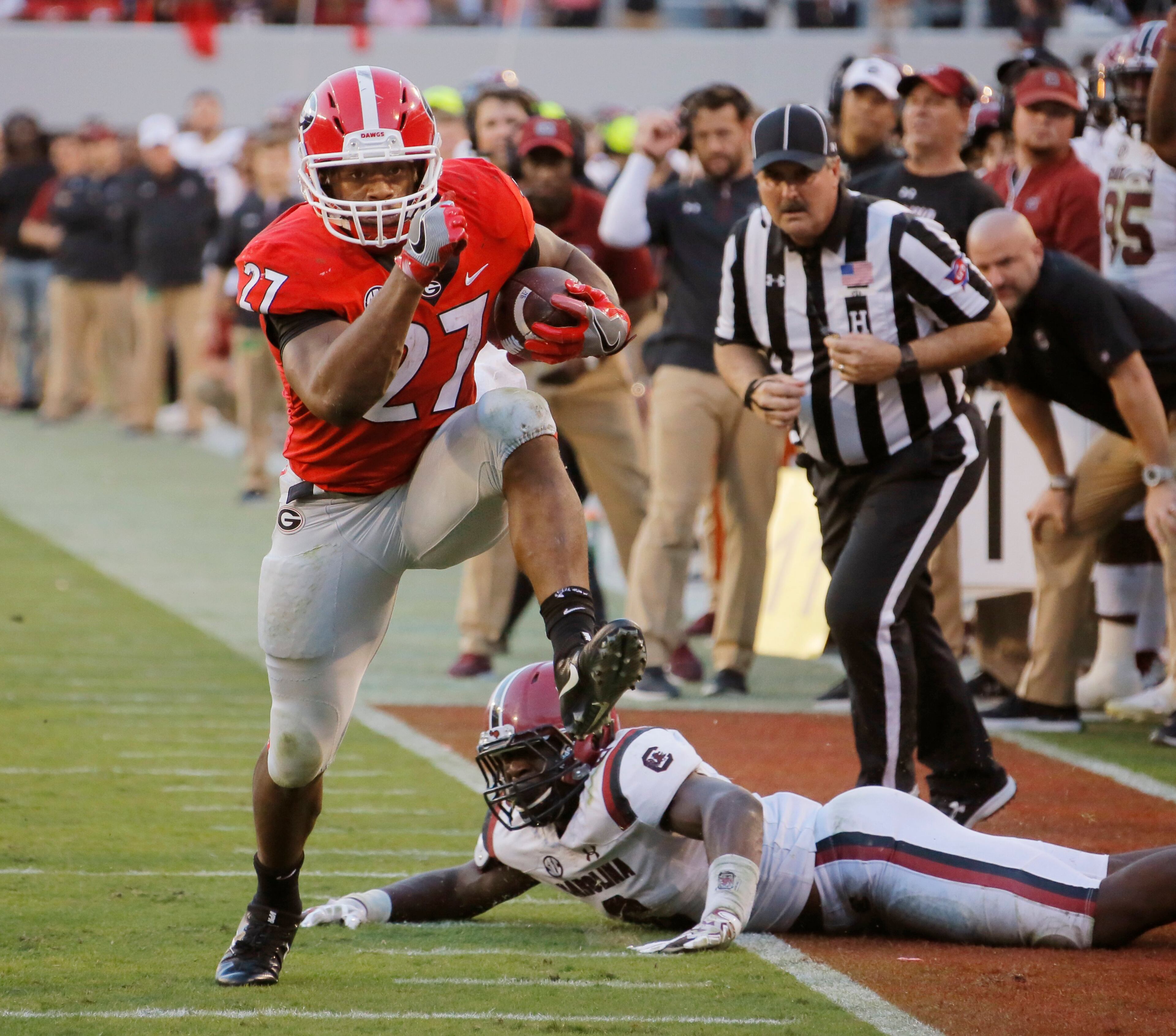 11/4/17 - Athens - Georgia Bulldogs running back Nick Chubb (27) runs for a first down to the five yard line to set up a UGA field goal. NCAA football game between the University of Georgia Bulldogs and the University of South Carolina Gamecocks BOB ANDRES /BANDRES@AJC.COM