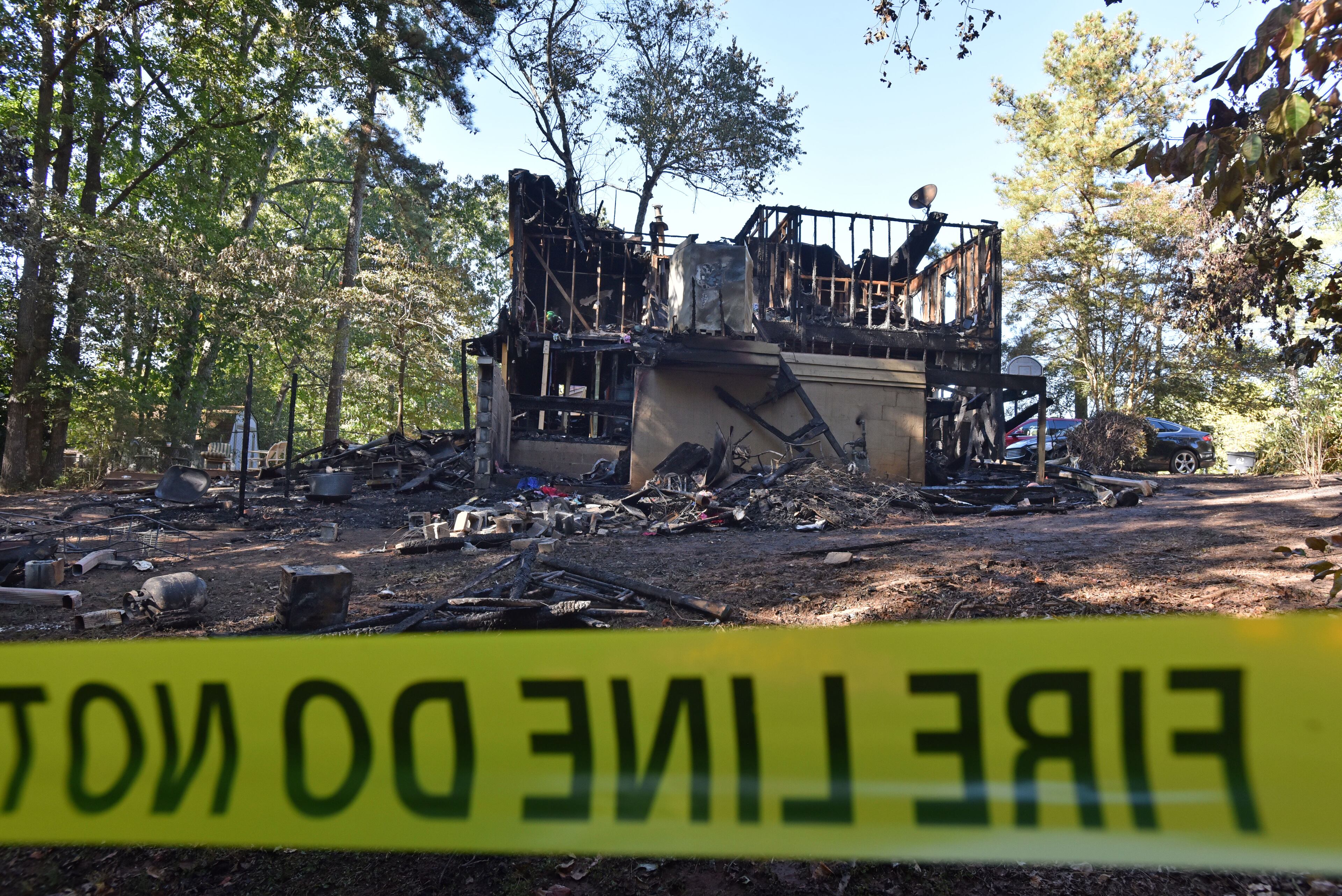 October 23, 2016 Duluth - Five adults were found dead after a fire gutted a home in the 2200 block of Post Oak Drive in unincorporated Duluth early Sunday morning on Sunday, October 23, 2016. Five people are dead after a fire gutted a home in unincorporated Duluth early Sunday morning, Gwinnett County fire officials said. Gwinnett County Department of Fire and Emergency Services Capt. Tommy Rutledge confirmed that five adults were found dead in the home in the 2200 block of Post Oak Drive NW, a two-story structure in the middle of a dead-end street near Old Peachtree Road. HYOSUB SHIN / HSHIN@AJC.COM