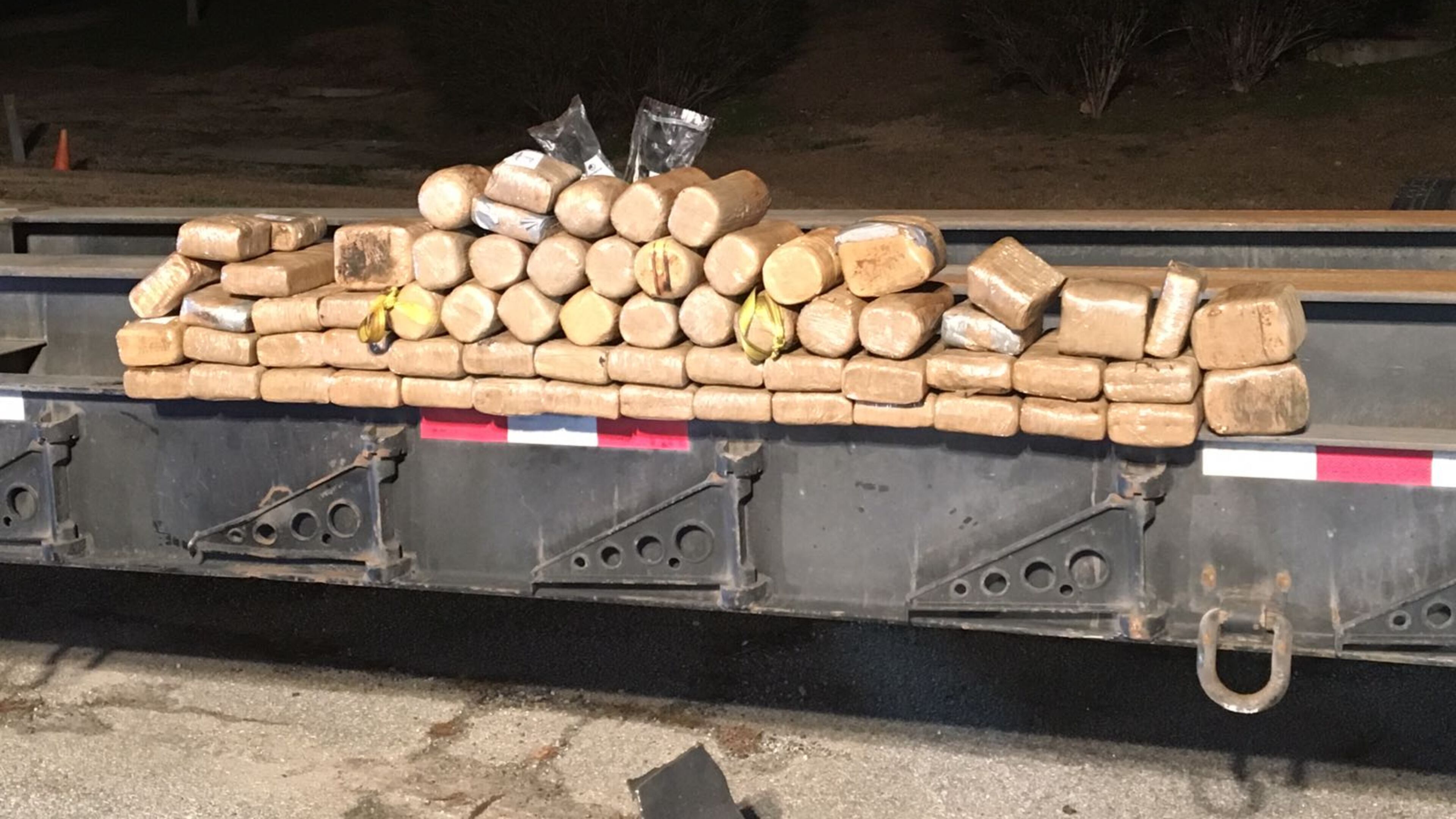 A search turned up 154 pounds of cocaine hidden within the axle of a utility trailer in Chattahoochee Hills.