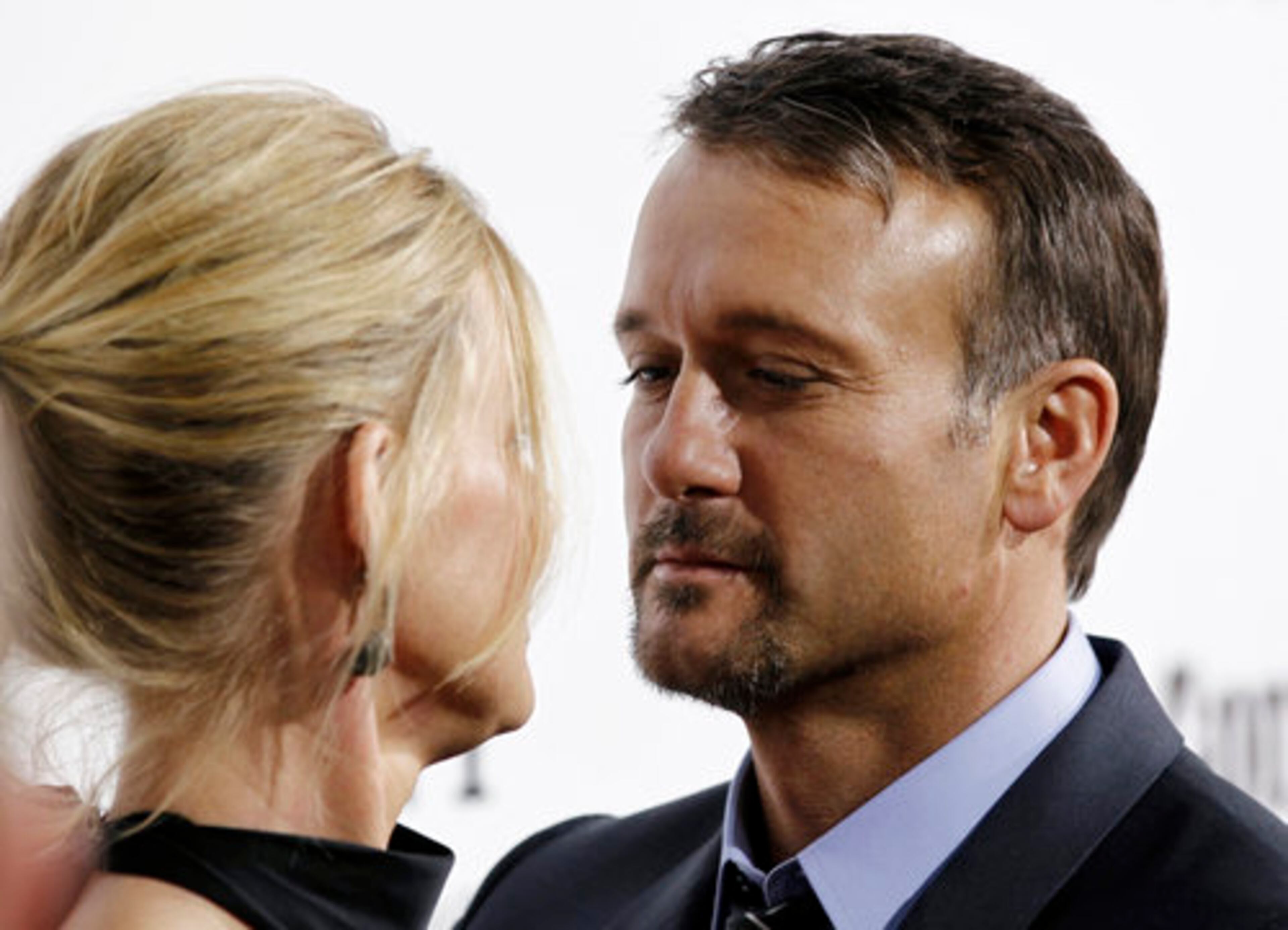 Cast member Tim McGraw and Faith Hill arrive for a screening of "Country Strong" in Beverly Hills on Tuesday, Dec. 14, 2010.