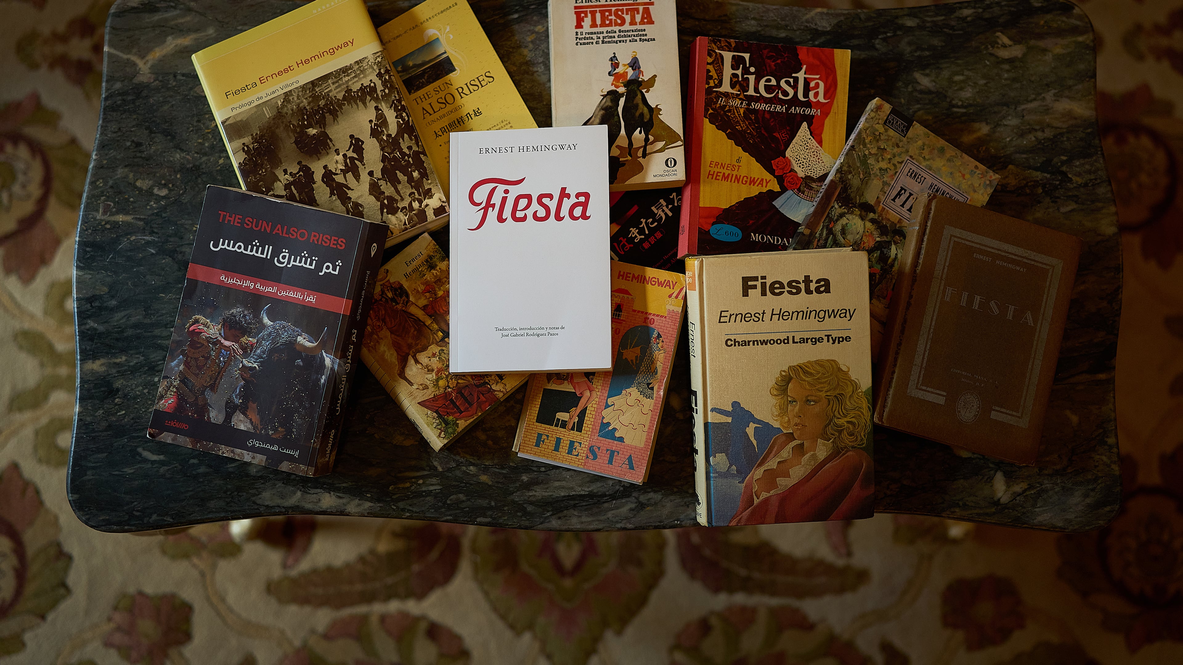Books by Ernest Hemingway are photographed in the Ernest Hemingway Suite at the Gran Hotel La Perla in Pamplona, northern Spain, Thursday, July 2, 2026. (AP Photo/Miguel Oses)