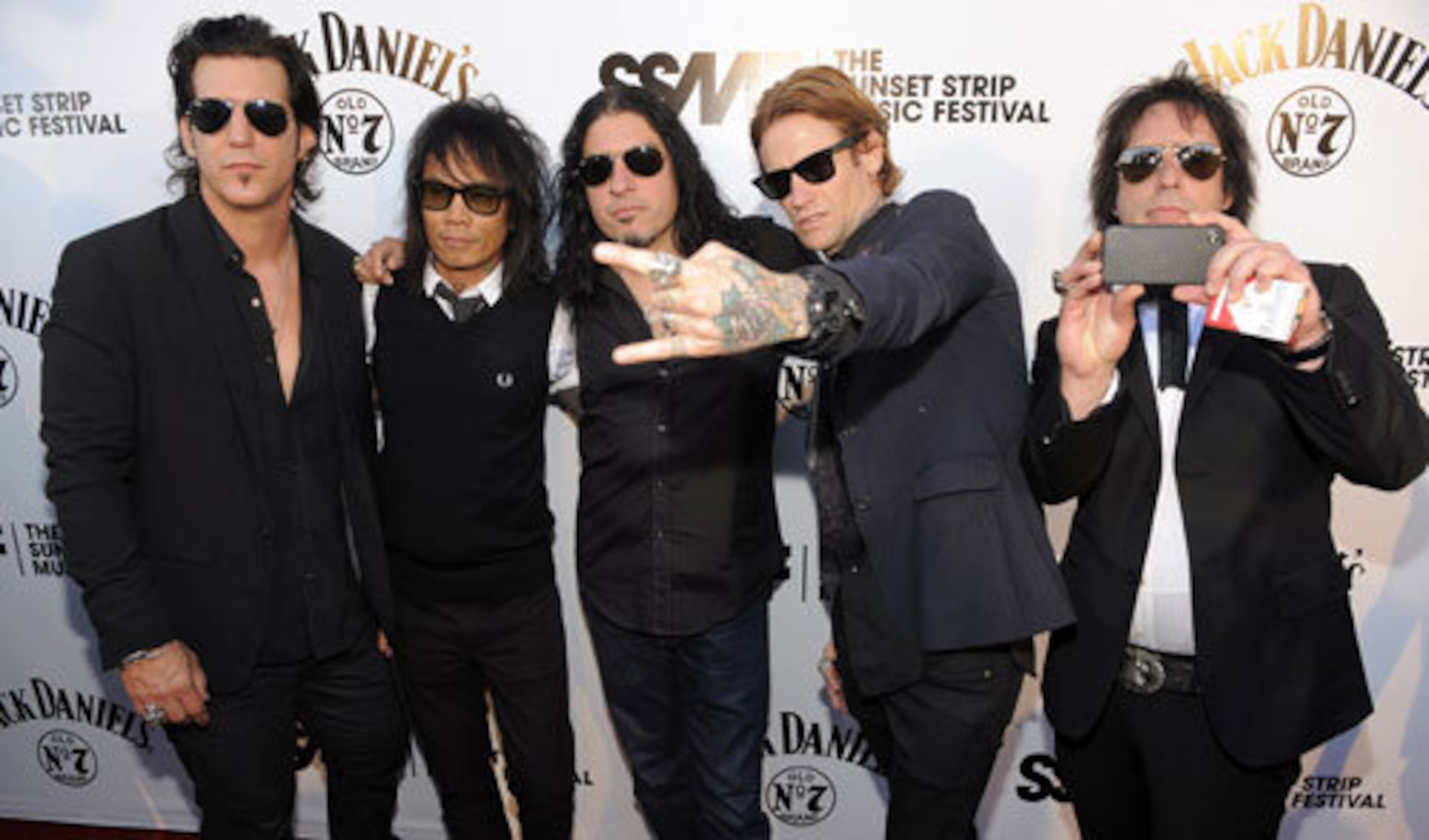 From left, Keith Nelson, Stevie D., Xavier Muriel, Josh Todd and Jimmy Ashhurst of the band Buckcherry arrive for the Motley Crue tribute.