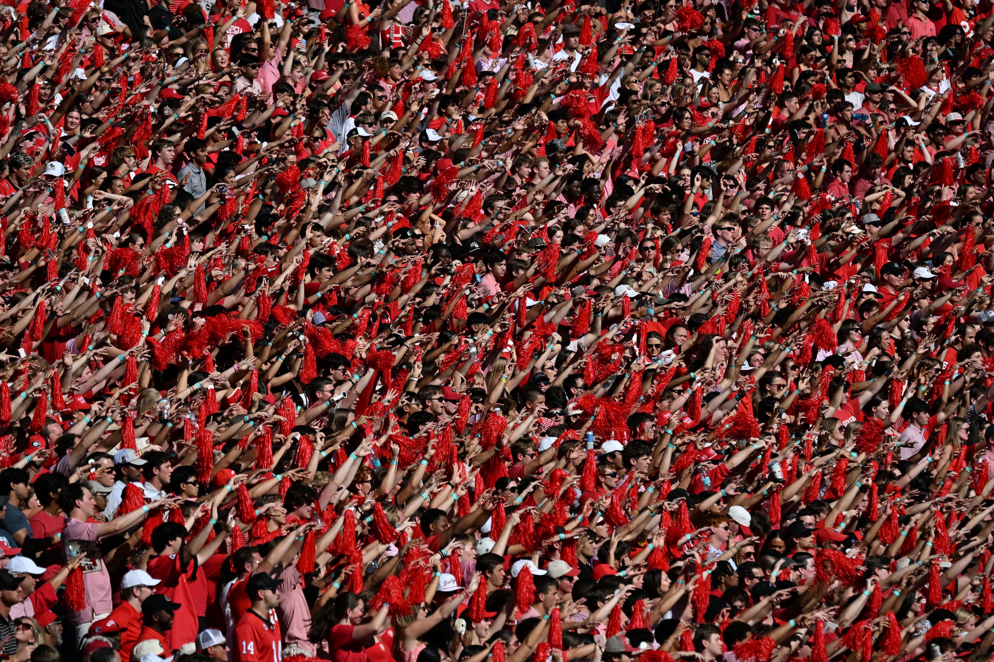 Georgia fans cheer during the first half of an NCAA football game against Oklahoma at Sanford Stadium on Saturday, Sept. 26, 2026, in Athens, Ga. (Hyosub Shin/AJC)