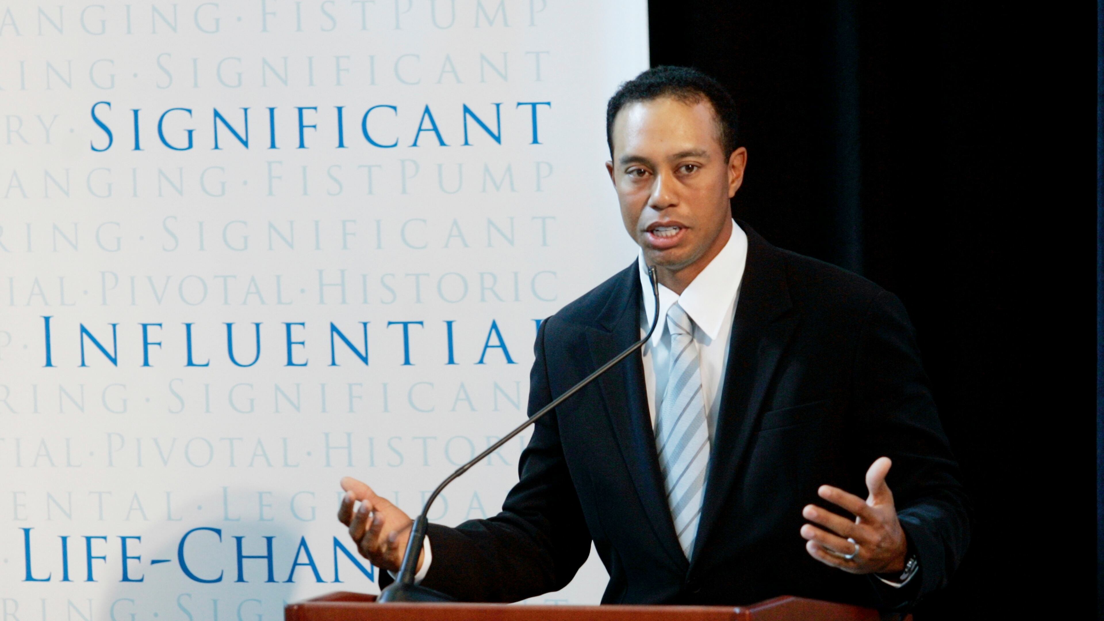 FILE - Golfer Tiger Woods announces the launch of a nationwide youth program called the "Fist Pump Challenge" in Anaheim, Calif., Jan. 21, 2008. (AP Photo/Damian Dovarganes, File)