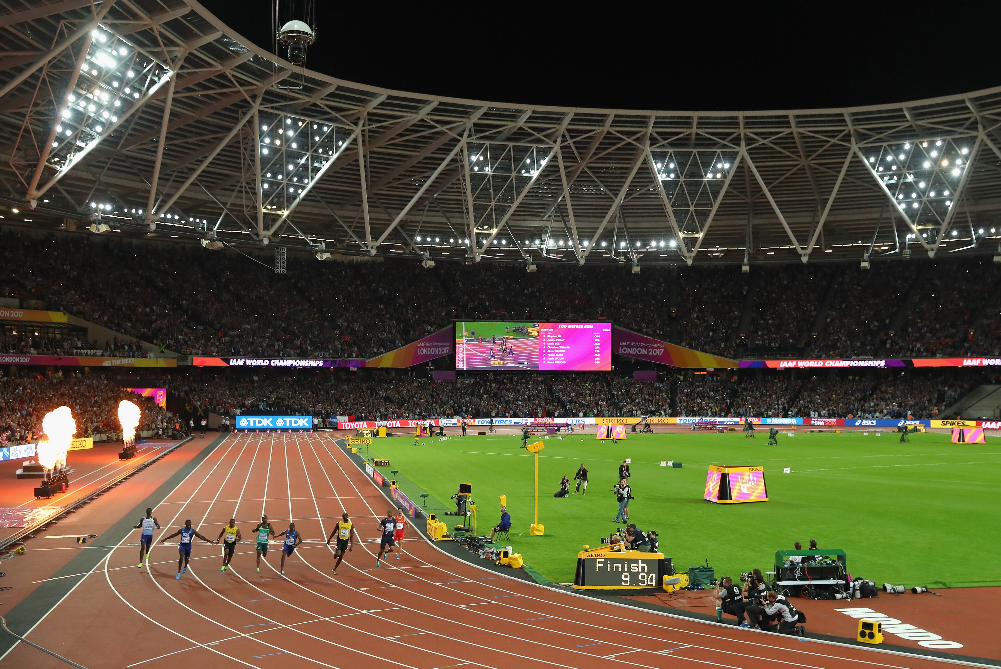 LONDON, ENGLAND - AUGUST 05: A general view as (L-R) Reece Prescod of Great Britain, Justin Gatlin of the United States, (Winner) Yohan Blake of Jamaica, Akani Simbine of South Africa, Christian Coleman of the United States, Usain Bolt of Jamaica, Jimmy Vicaut of France and Bingtian Su of China cross the finish line in the men's 100m final during day two of the 16th IAAF World Athletics Championships London 2017 at The London Stadium on August 5, 2017 in London, United Kingdom. (Photo by Richard Heathcote/Getty Images)