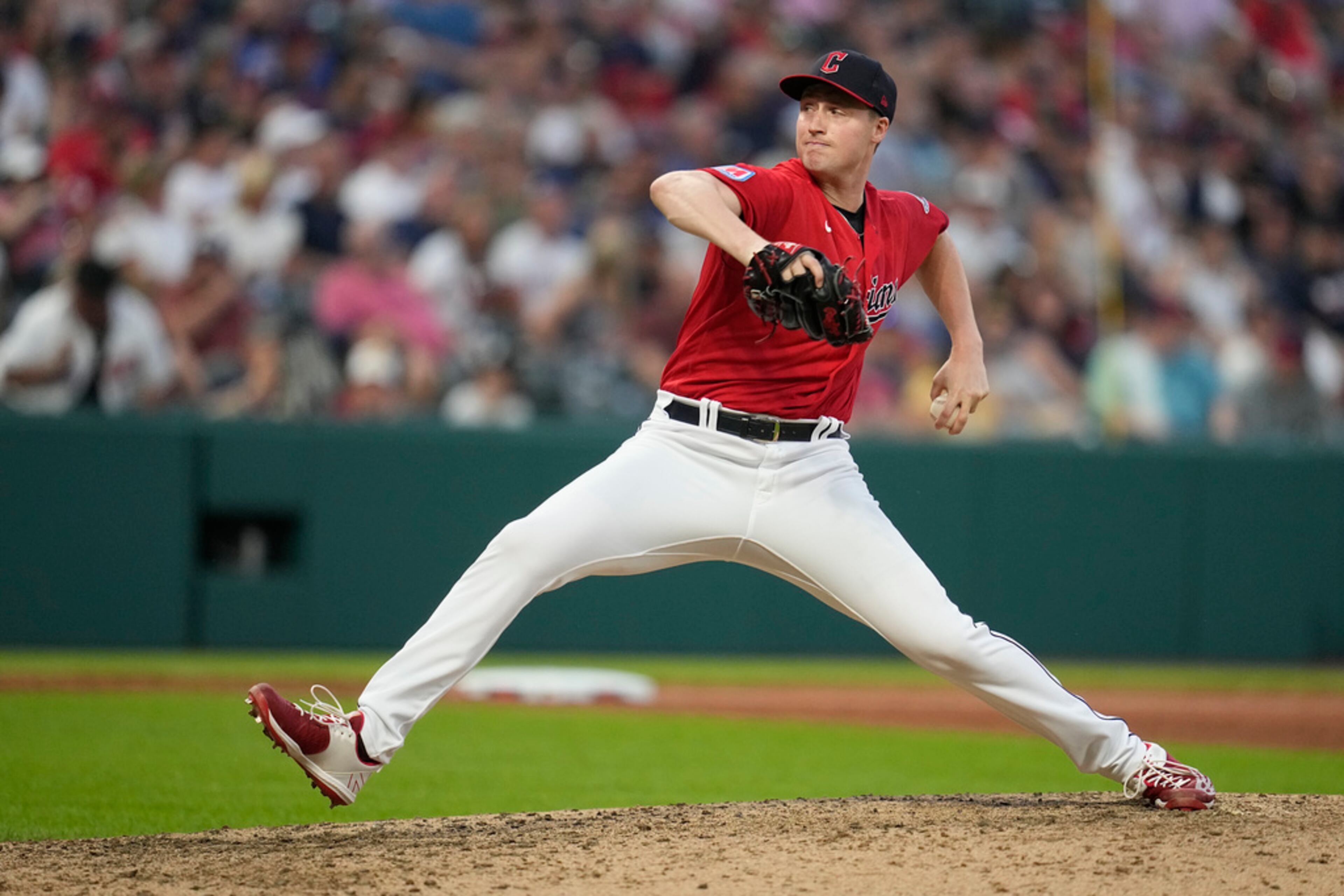 Cleveland Guardians' Tim Herrin pitches to an Atlanta Braves batter duriing the sixth inning of a baseball game Wednesday, July 5, 2023, in Cleveland. (AP Photo/Sue Ogrocki)