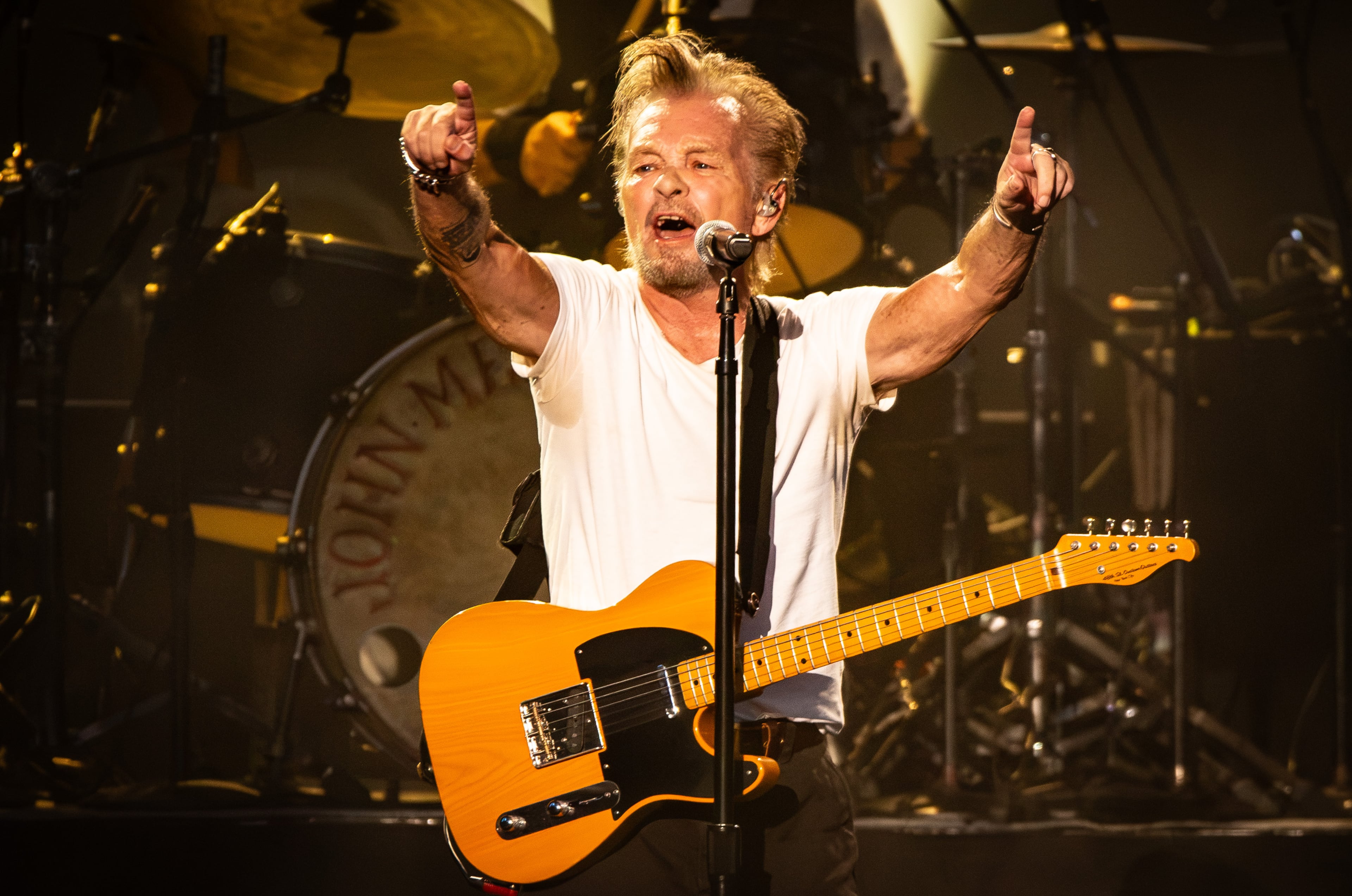 Alpharetta. GA: John Mellencamp visited America Bank Amphitheatre on his Dancing Words tour Saturday night. Running through two acts, with a 15 minute intermission, Mellencamp played nearly forty songs to a sing-along crowd. Photo taken Thursday August 1, 2026 at Ameris Bank Amphitheatre. Mellencamp (RYAN FLEISHER FOR THE ATLANTA JOURNAL-CONSTITUTION)