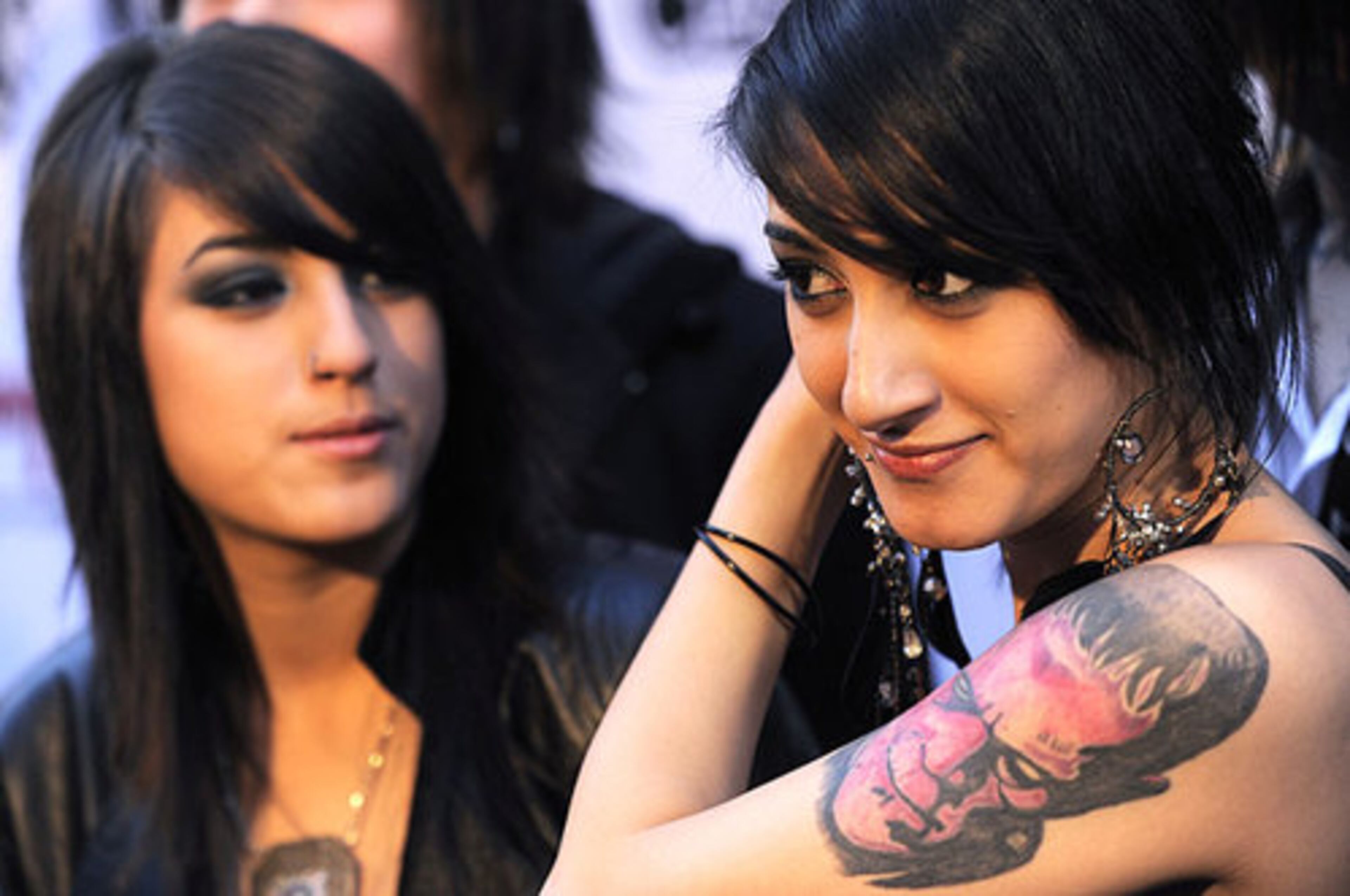 Anissa Rodriguez, left, and her sister Alexia of the band Eyes Set to Kill, nominees for the Hottest Chick(s) in Metal award.