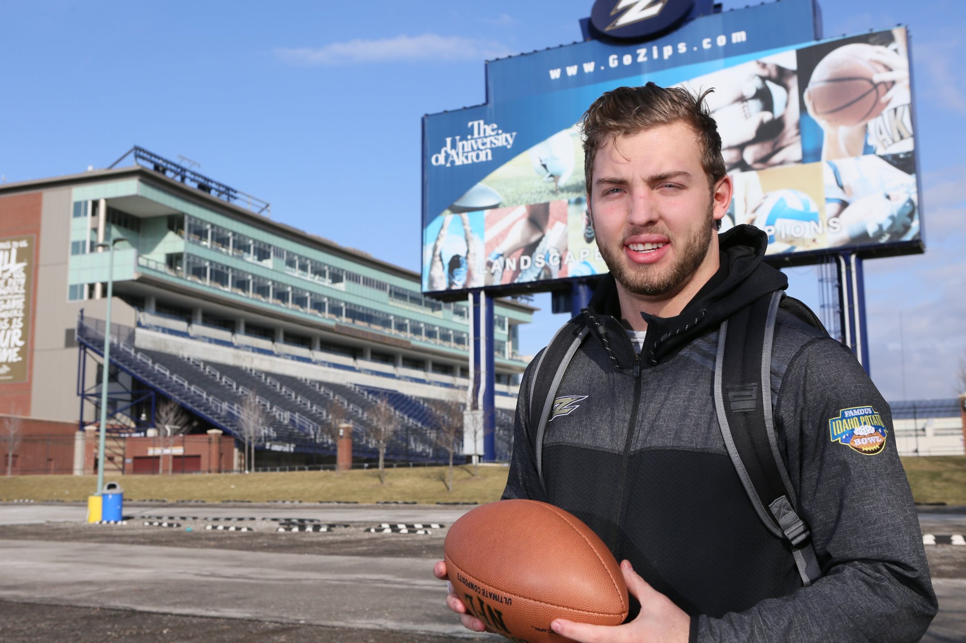 Brian Bell outside the University of Akron's stadium last weekend. (Lew Stamp / for the AJC)