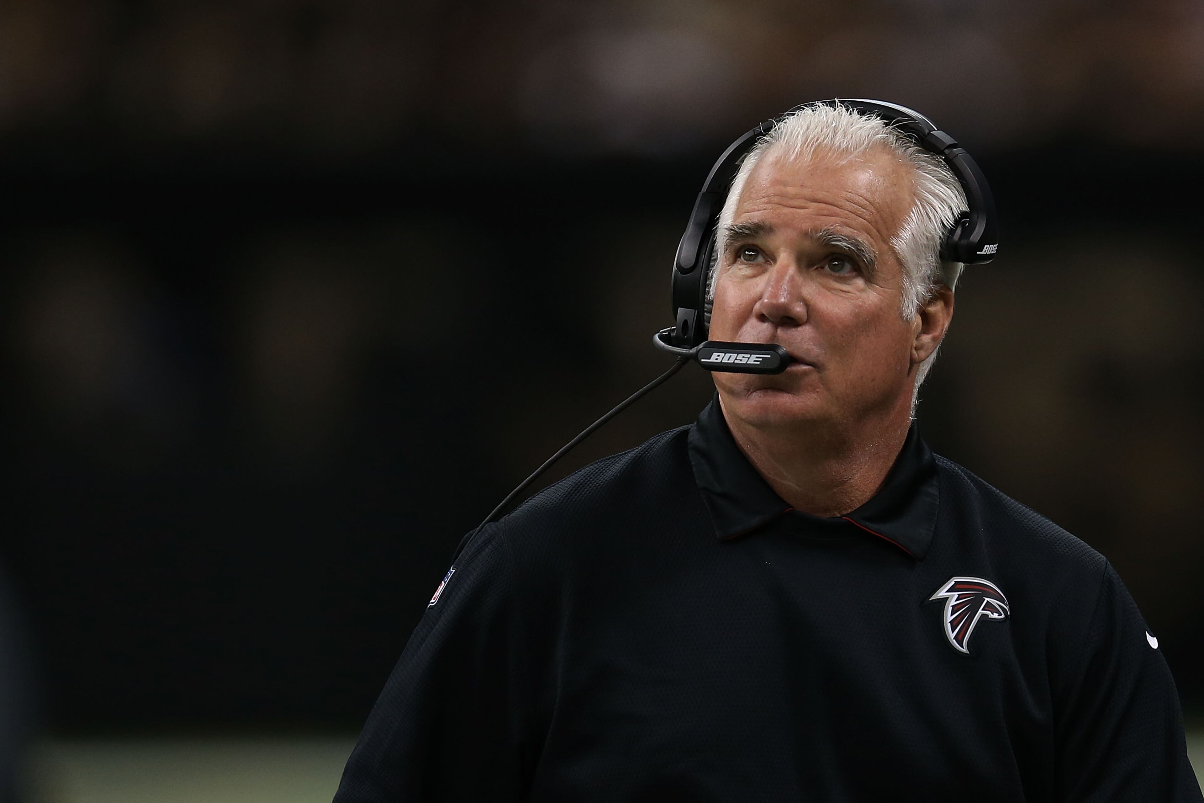 NEW ORLEANS, LA - DECEMBER 21: Head coach Mike Smith of the Atlanta Falcons watches action during the second quarter of game against the New Orleans Saints at the Mercedes-Benz Superdome on December 21, 2014 in New Orleans, Louisiana. (Photo by Chris Graythen/Getty Images)