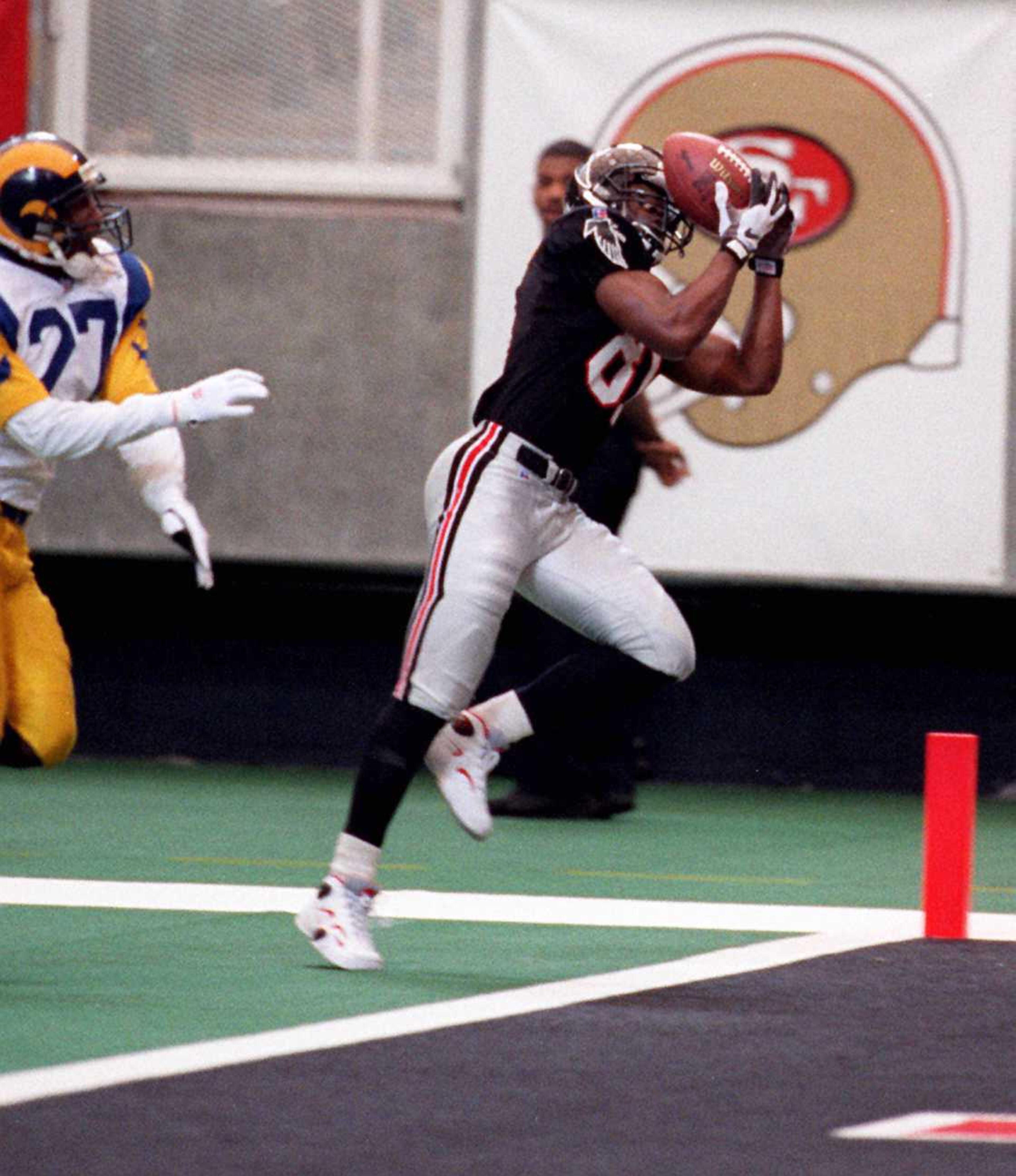 Atlanta Falcons wide receiver Terance Mathis catches a TD pass in the first quarter of play against the St. Louis Rams Sunday, November 19, 1995 in the Georgia Dome. (AJC photo/Jonathan Newton)