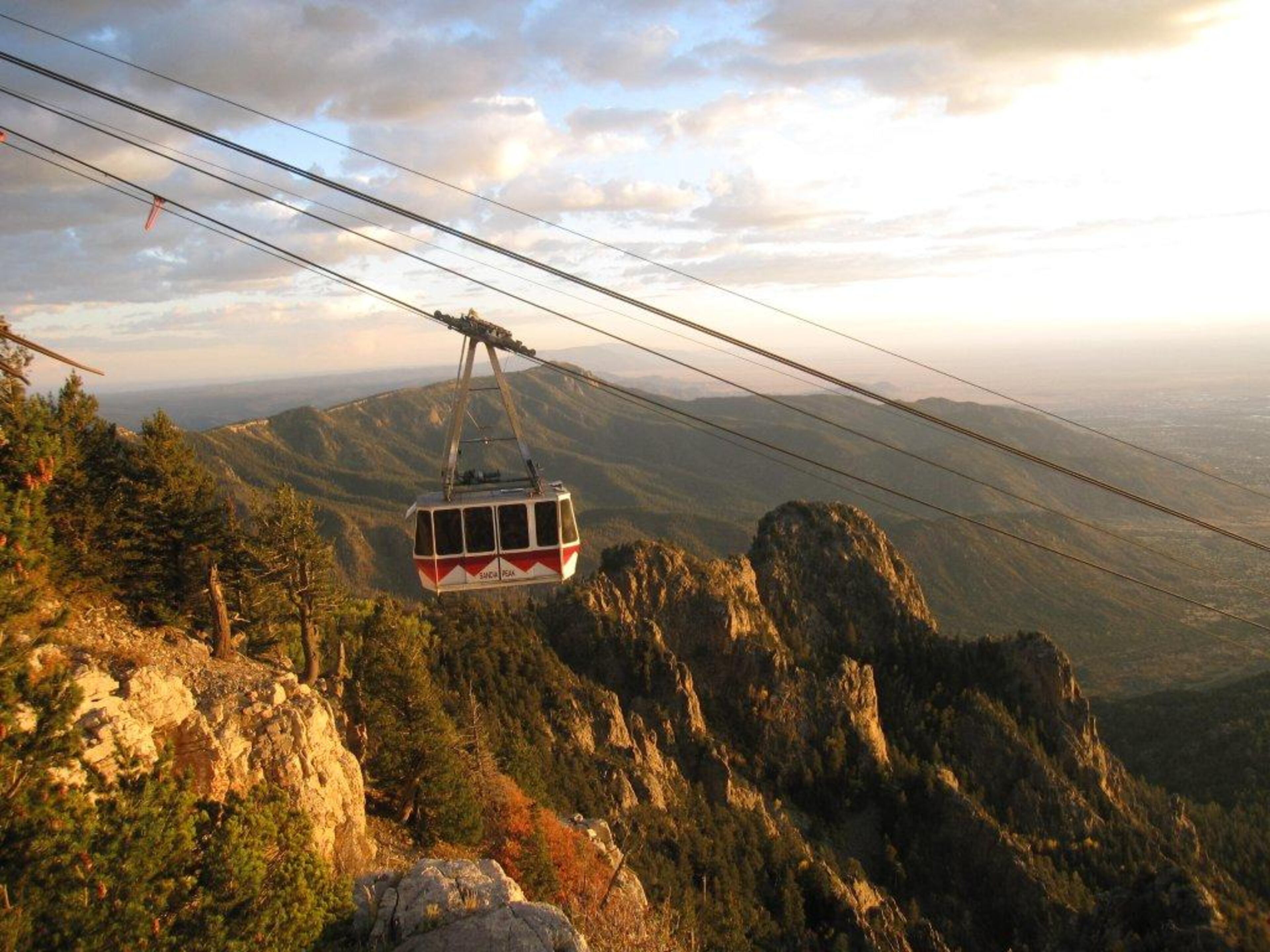 This Sept. 30, 2012 photo shows the Sandia Peak Tram in Albuquerque, N.M. The tram is one of Albuquerque's top attractions, and a sunset ride offers spectacular views of the western sky along with views of the Sandia Mountains and the city. (AP Photo/Beth Harpaz)