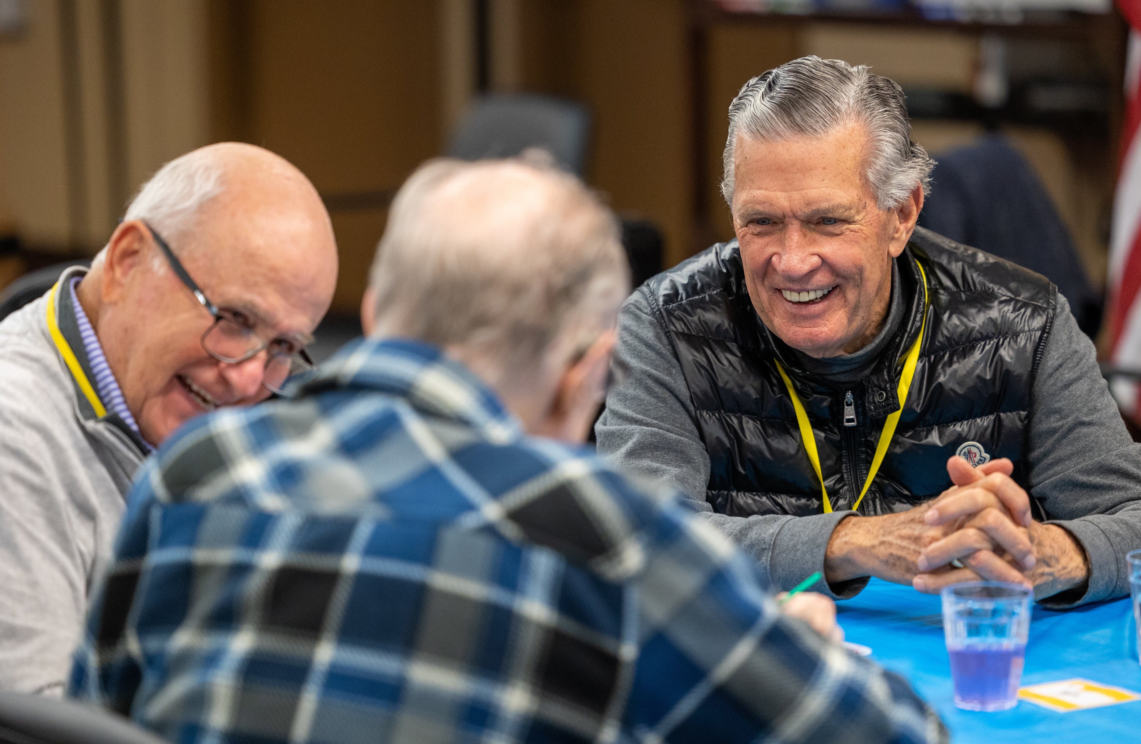 Volunteers Jim Howard (left) Ben Jenkins work on art project with a member during a Respite Care Atlanta meeting at Second-Ponce de Leon Baptist Church in Atlanta.
PHIL SKINNER FOR THE ATLANTA JOURNAL-CONSTITUTION