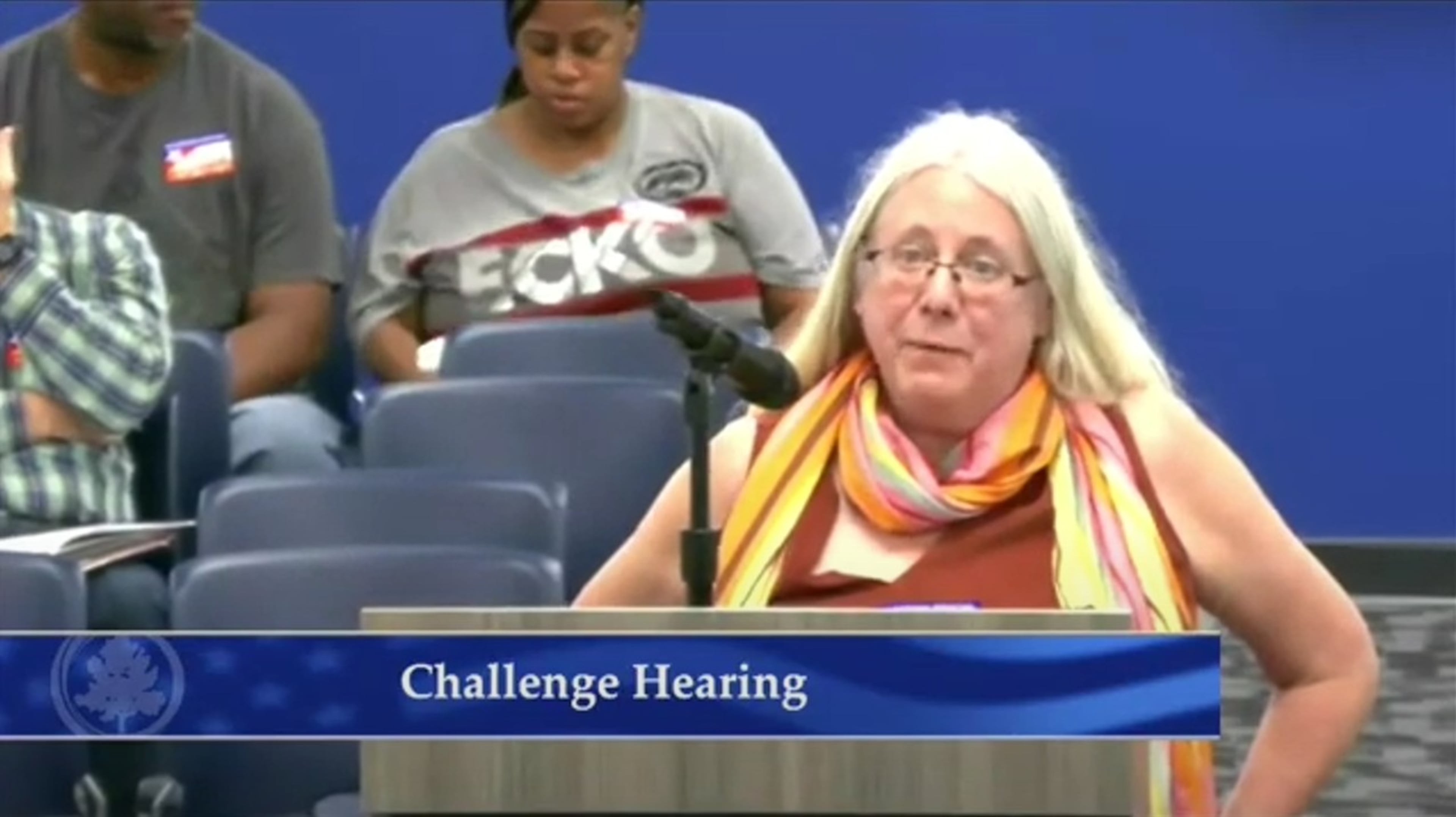 Maria Williamson defended her voter registration to the Fulton County Election Board. The board had challenged Williamson's registration because she lived at the Buckhead antique store she runs. Photo via Fulton County / YouTube