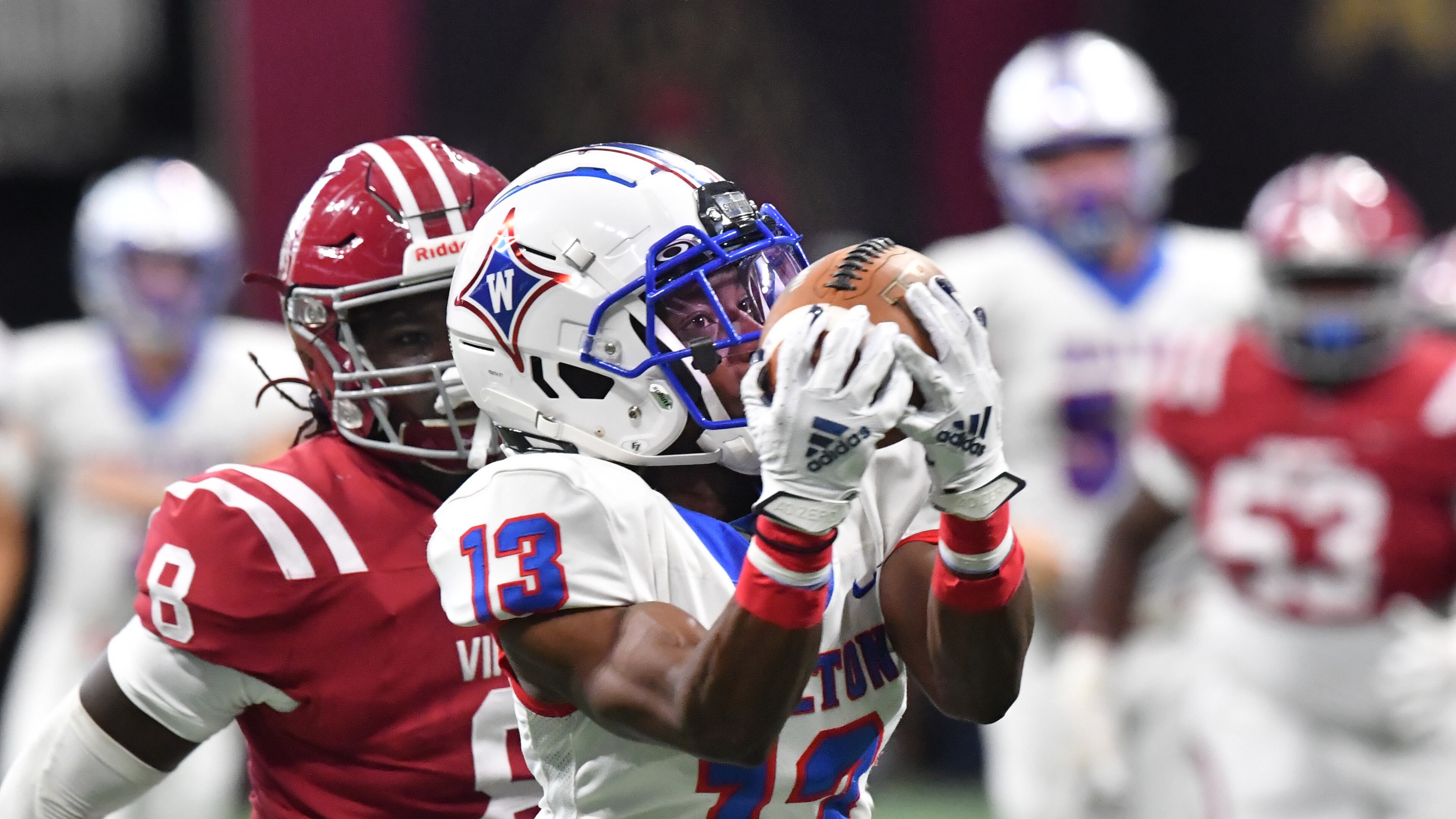 August 21, 2021 Atlanta - Walton's WR Mustafa Hefner (13) catches a touchdown pass during the 2021 Corky Kell Classic on Saturday, August 21, 2021. (Hyosub Shin / Hyosub.Shin@ajc.com)
