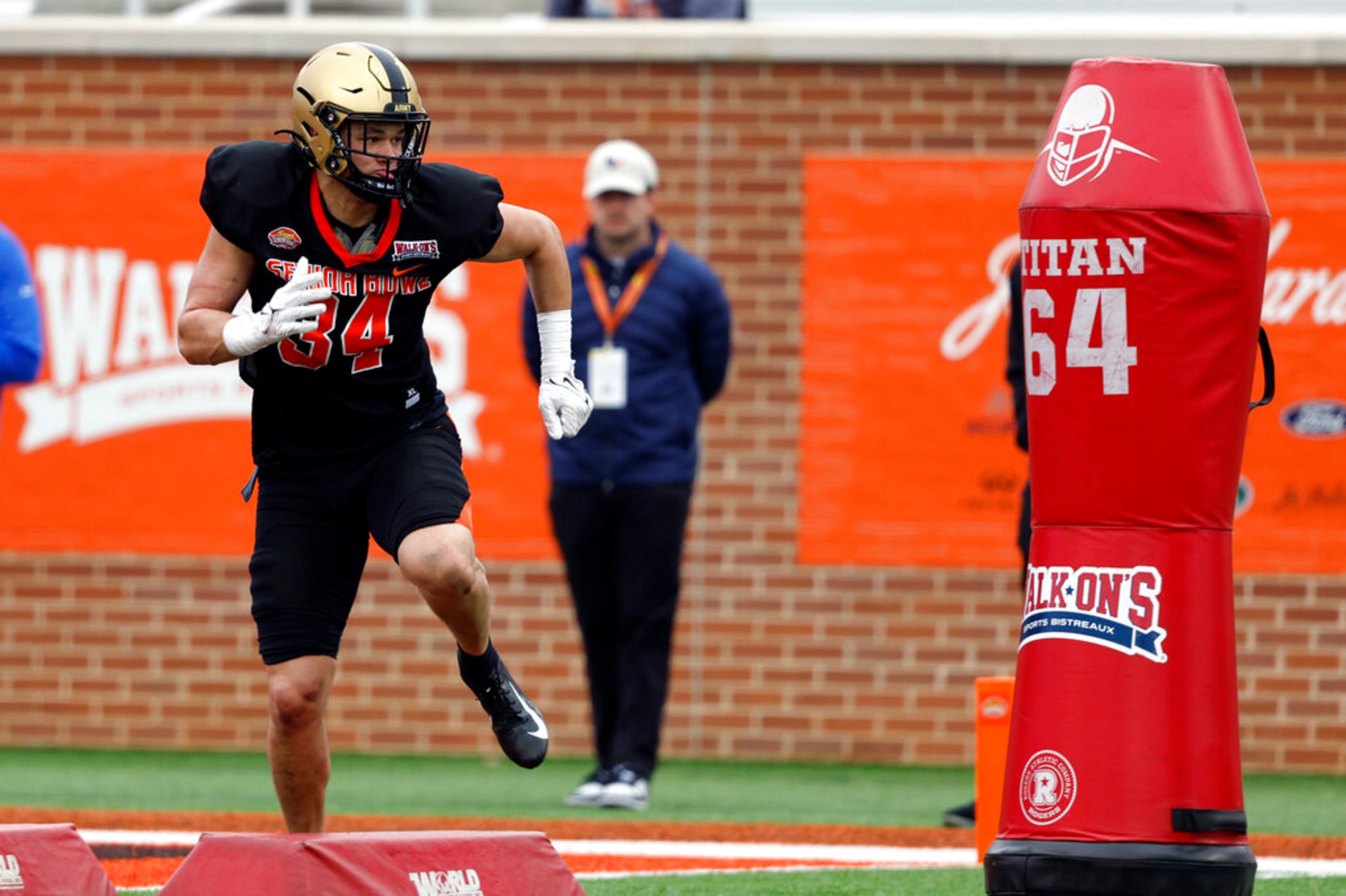 National linebacker Andre Carter II of Army (34) runs drills during practice for the Senior Bowl NCAA college football game Wednesday, Feb. 1, 2023, in Mobile, Ala.. (AP Photo/Butch Dill)