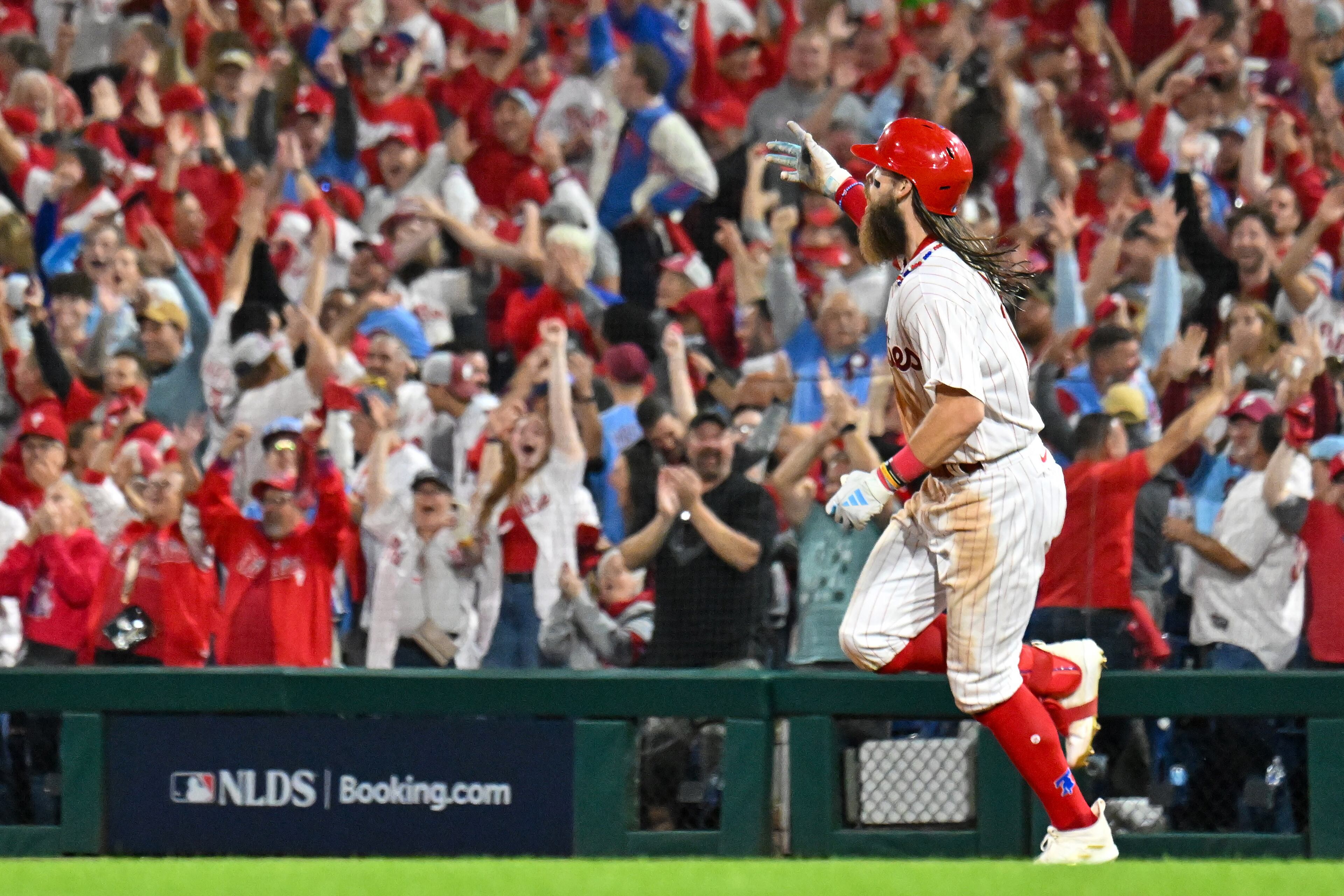 Philadelphia Phillies’ Brandon Marsh (16) hits a solo home run against the Atlanta Braves during the eighth inning of NLDS Game 3 in Philadelphia on Wednesday, Oct. 11, 2023. (Hyosub Shin / Hyosub.Shin@ajc.com)