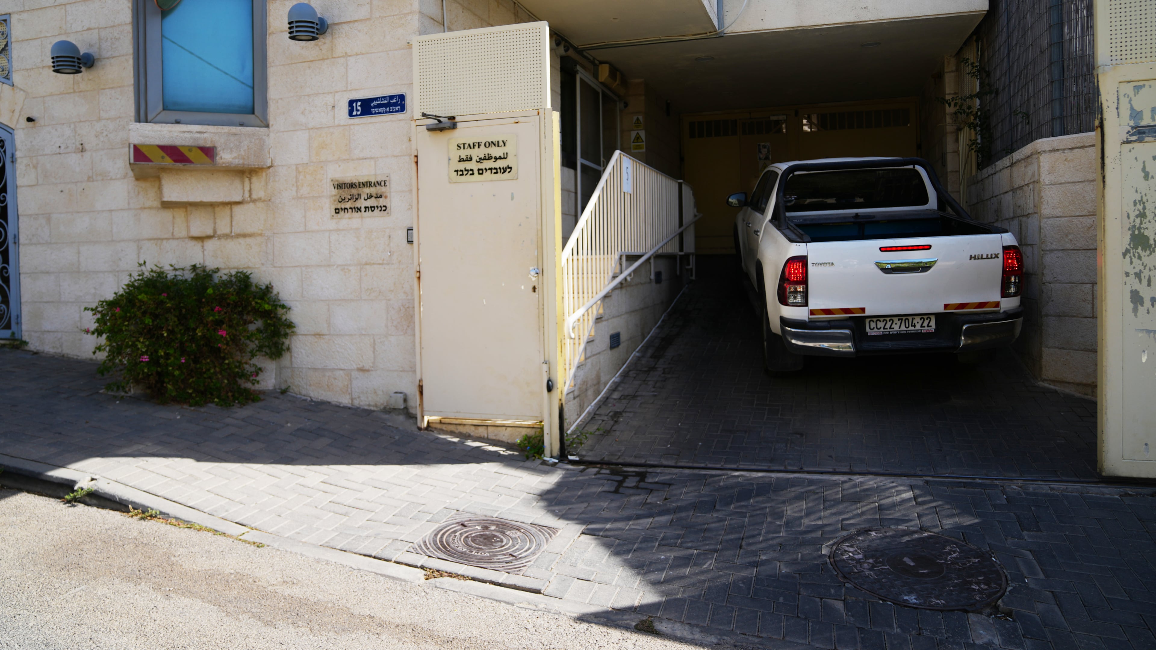 A car enters the British Consulate after the sign outside the consulate was taken down, in east Jerusalem, Thursday, Oct. 8, 2026. (AP Photo/Mahmoud Illean)
