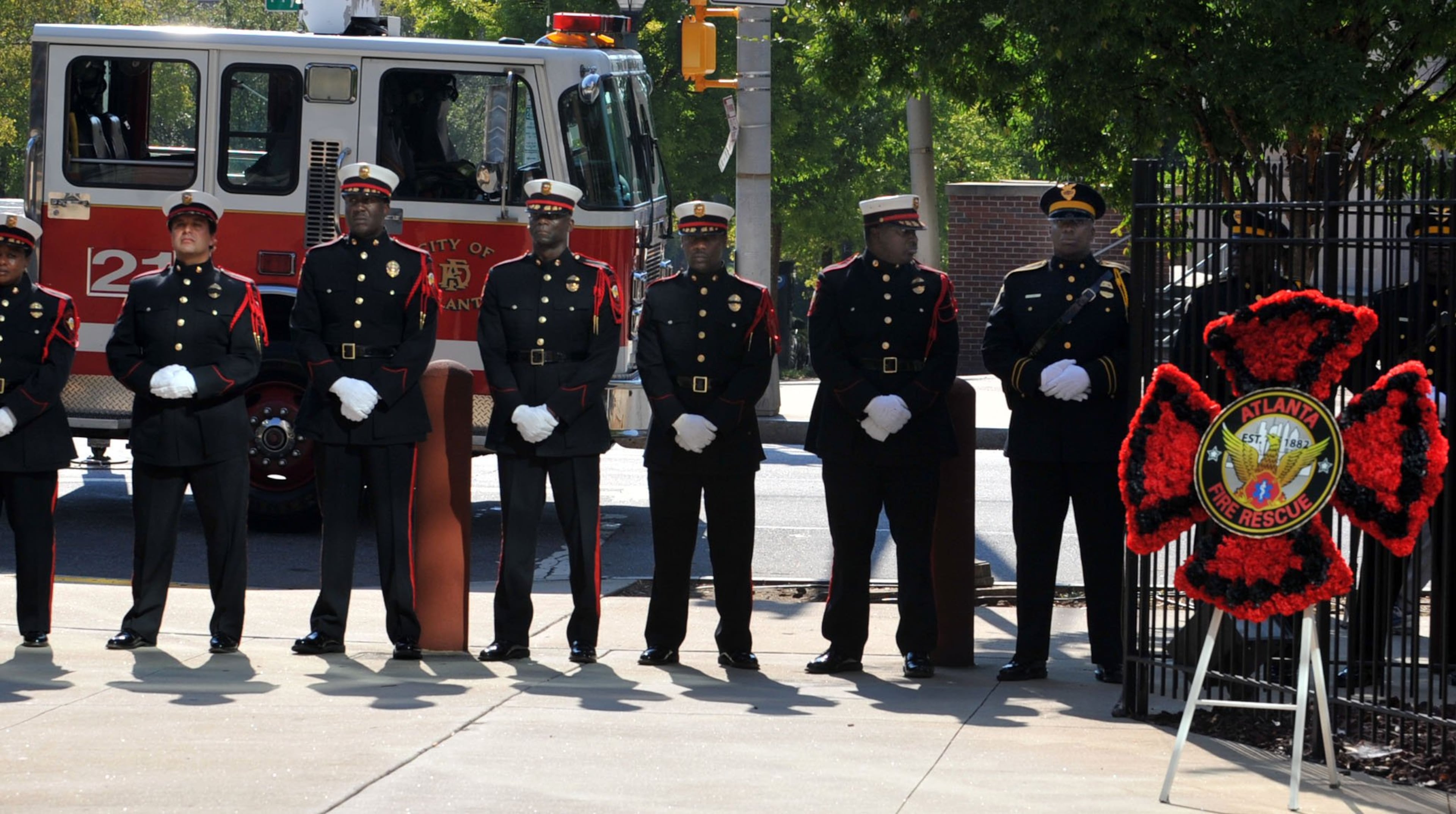 The Atlanta Fire Rescue Honor Guard stands at attention at the close of the ceremony. Officials with the Atlanta Police Department and Atlanta Fire Rescue Department honored the 12th anniversary of the Sept. 11, 2001, tragedy during a ceremony at Public Safety Headquarters on Sept. 11, 2013.
