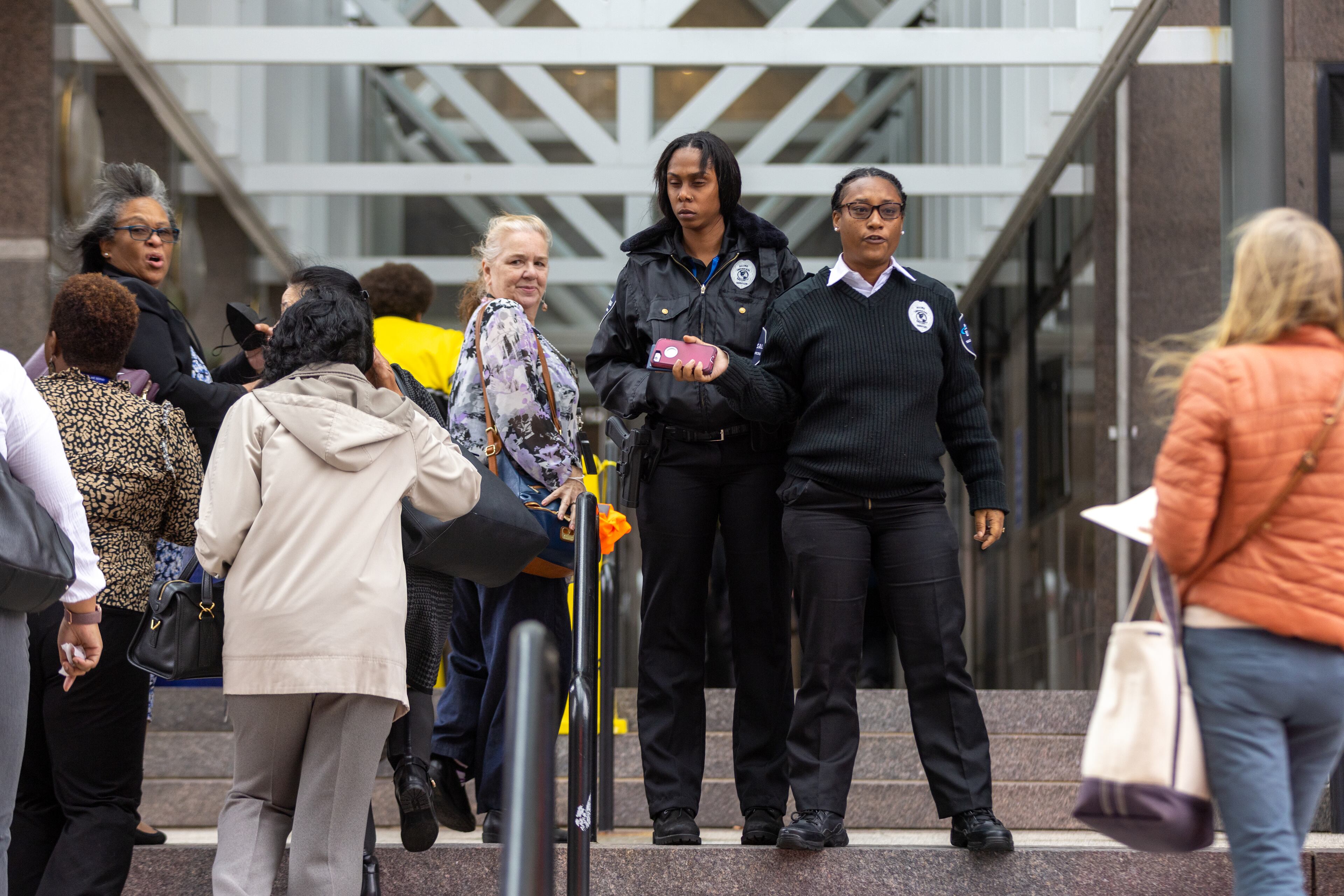 People are let back into Fulton County Government Center in Atlanta to retrieve personal belongings after a fire at the center forced at least a partial evacuation on Thursday, October 12, 2023. (Arvin Temkar / arvin.temkar@ajc.com)