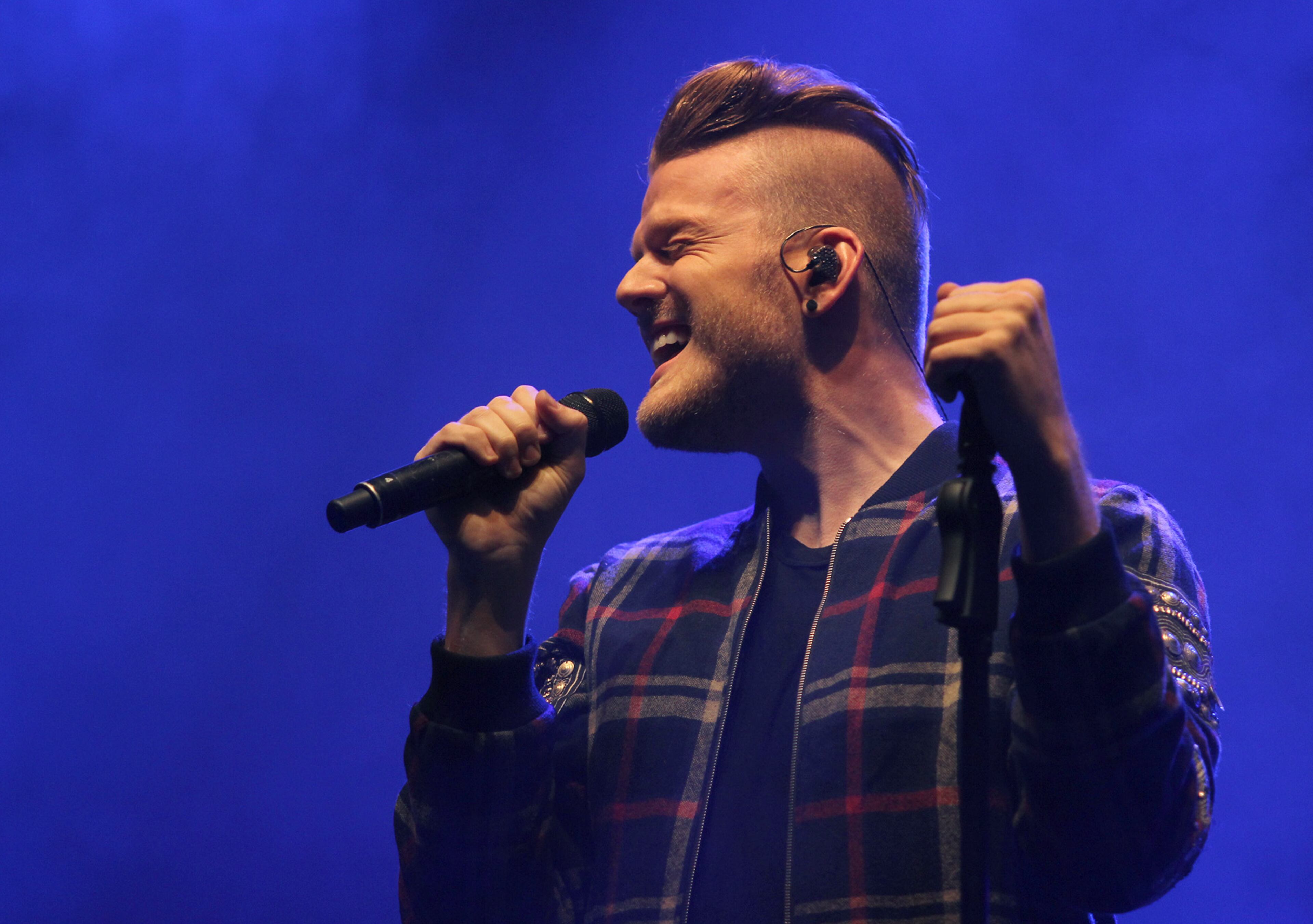 Scott Hoying, singer, songwriter, pianist and founding member of Pentatonix, performing at Star94 Jingle Jam at the Fox Theatre on Monday. (Akili-Casundria Ramsess/Special to the AJC)
